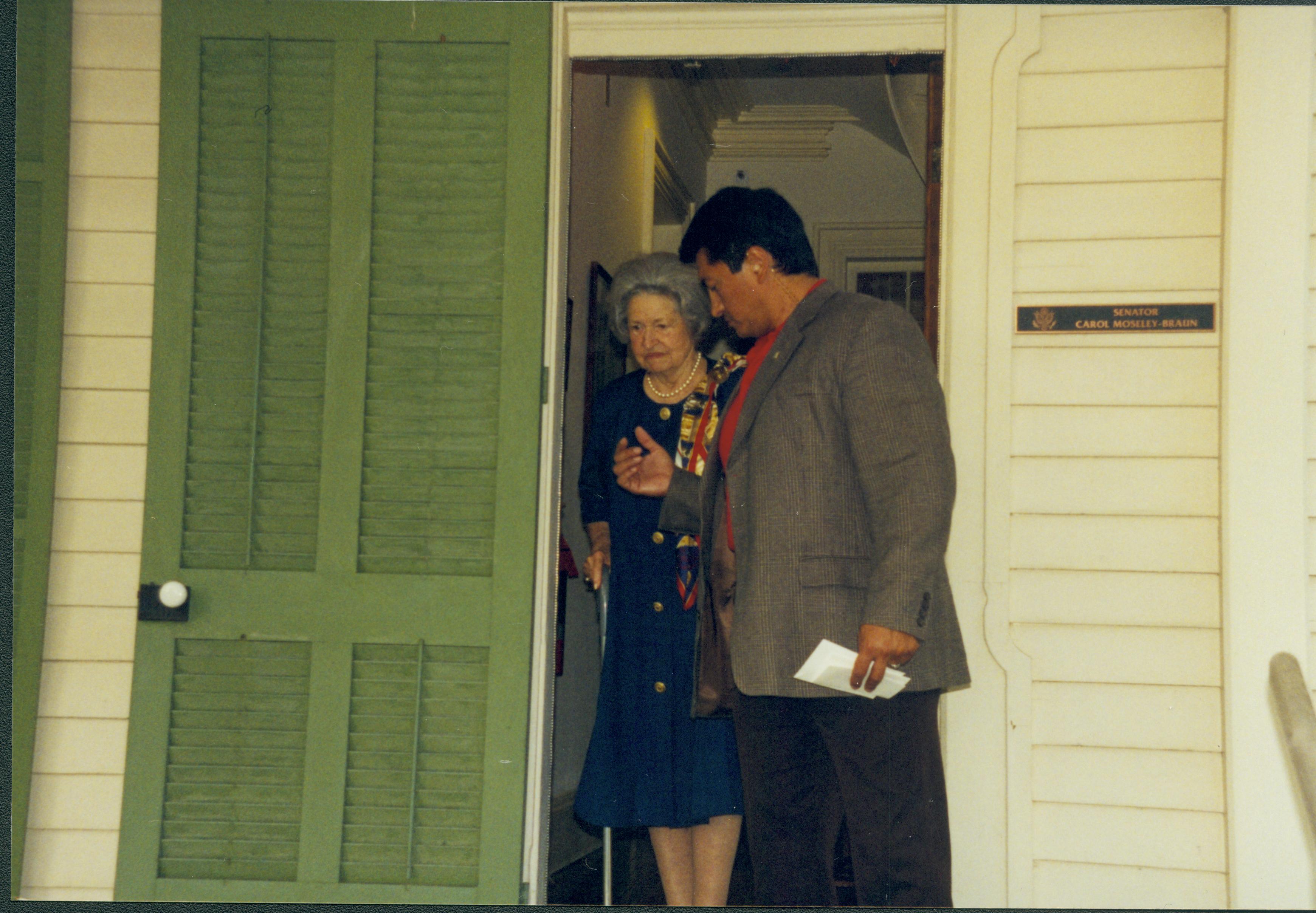 Two people coming our door of Sen. Braun's office. Lincoln Home NHS- Lady Bird Johnson visit, roll #2 neg #5 Johnson, visit, tour