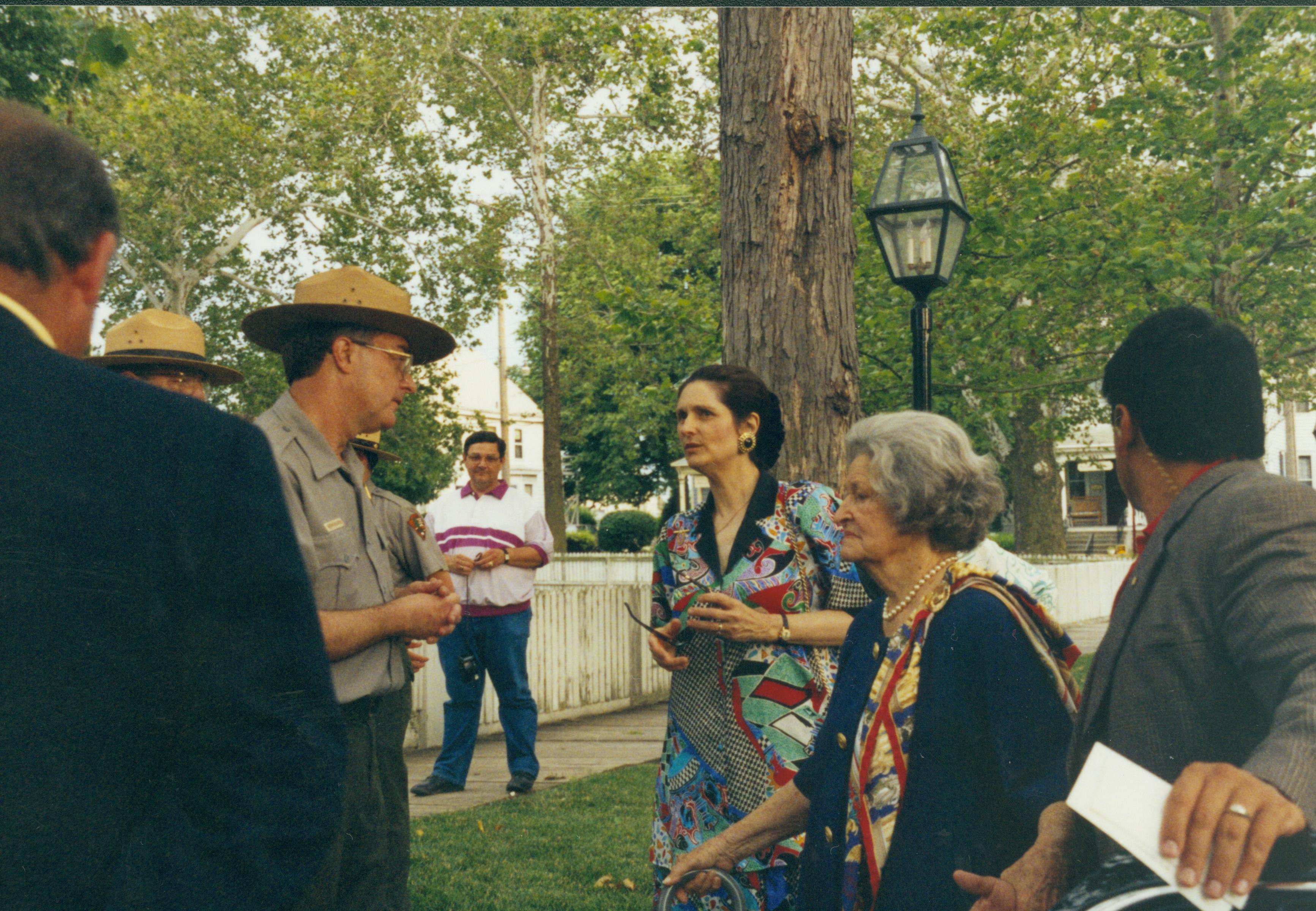 Ranger talking to visitors. Lincoln Home NHS- Lady Bird Johnson visit, roll #2 neg #10 Johnson, visit, tour