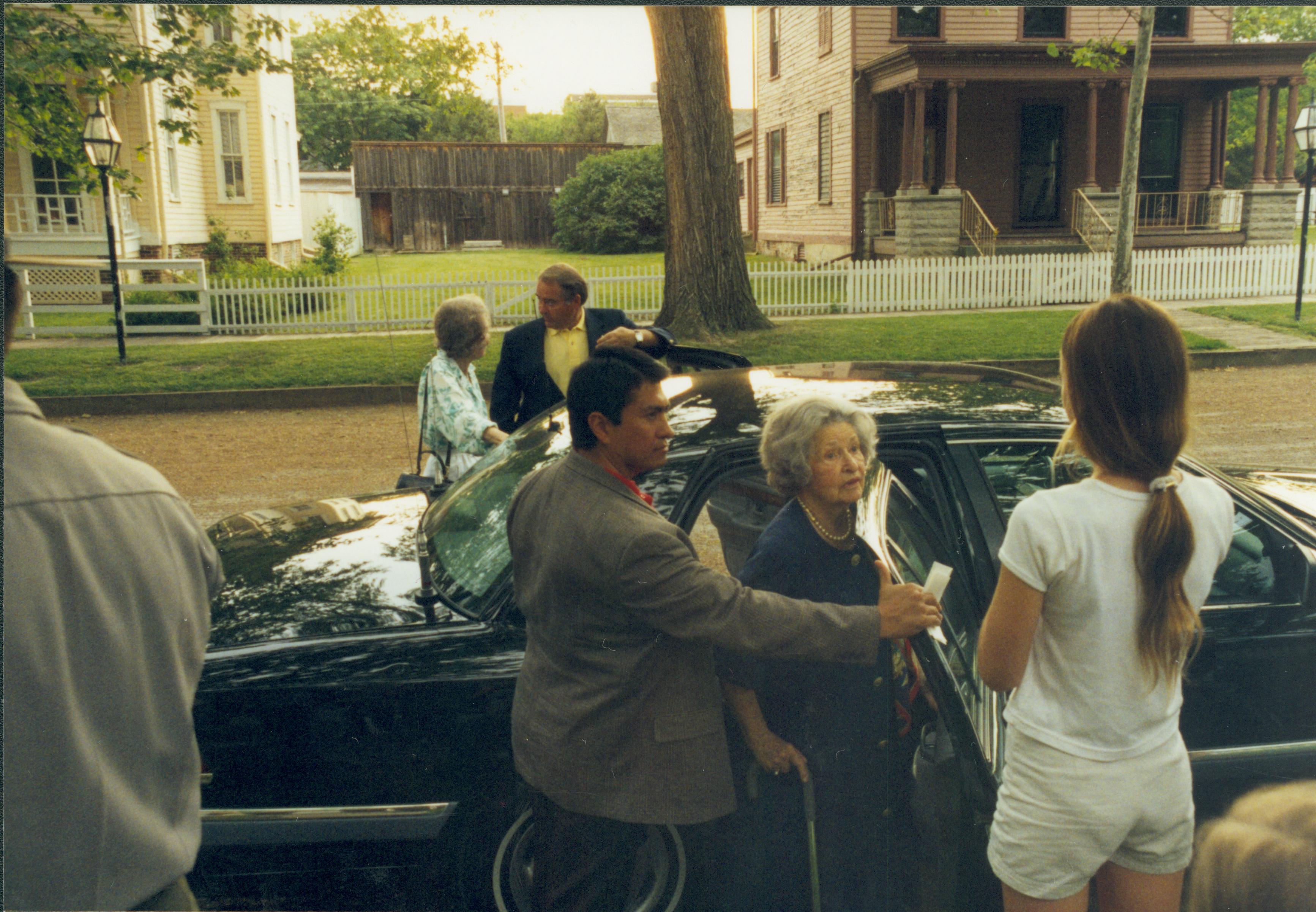 Lady getting out of car. Lincoln Home NHS- Lady Bird Johnson visit, roll #2 neg #12 Johnson, visit, tour