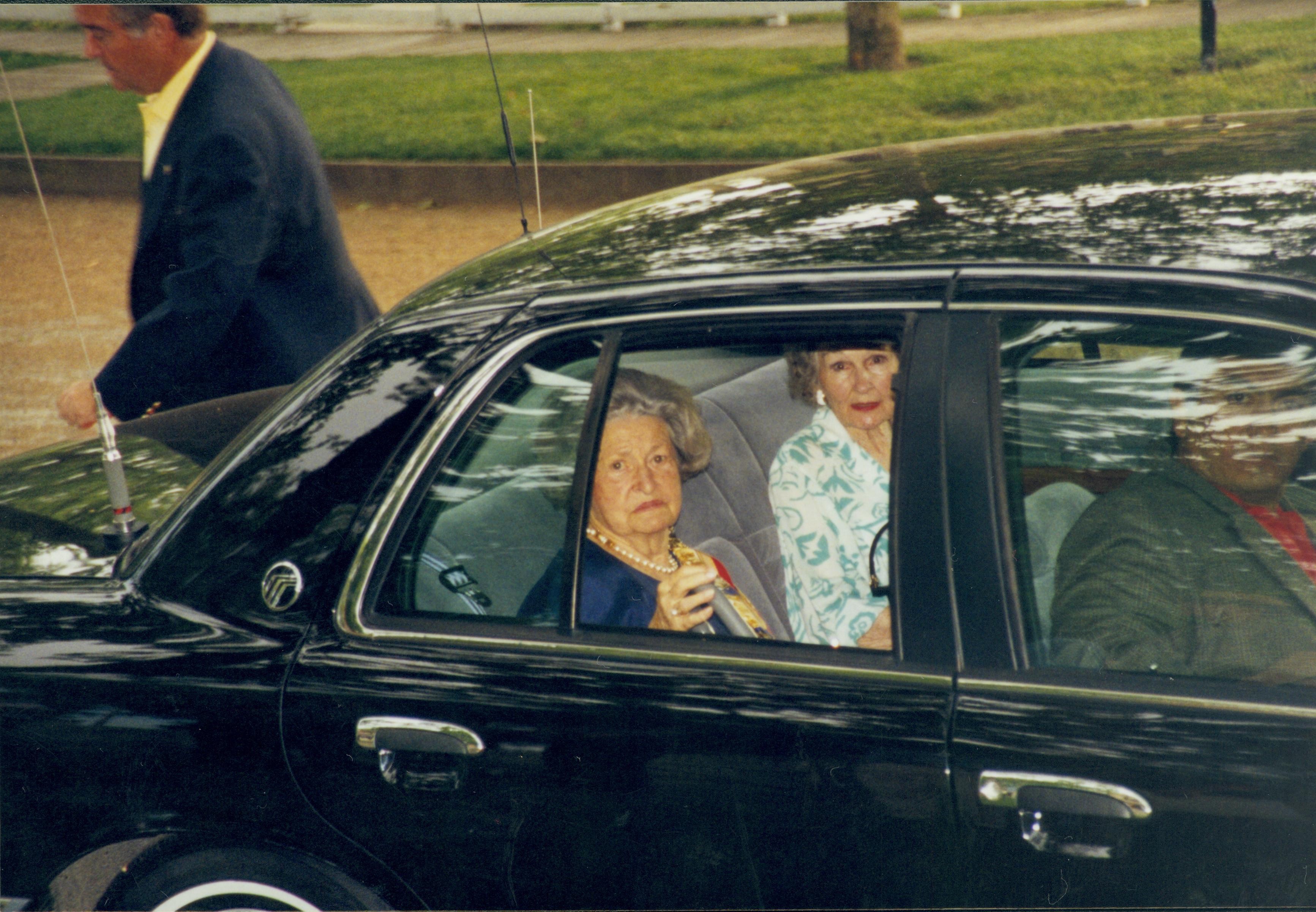 Two ladies in back seat of car. Lincoln Home NHS- Lady Bird Johnson visit, roll #2 neg #16 Johnson, visit, tour