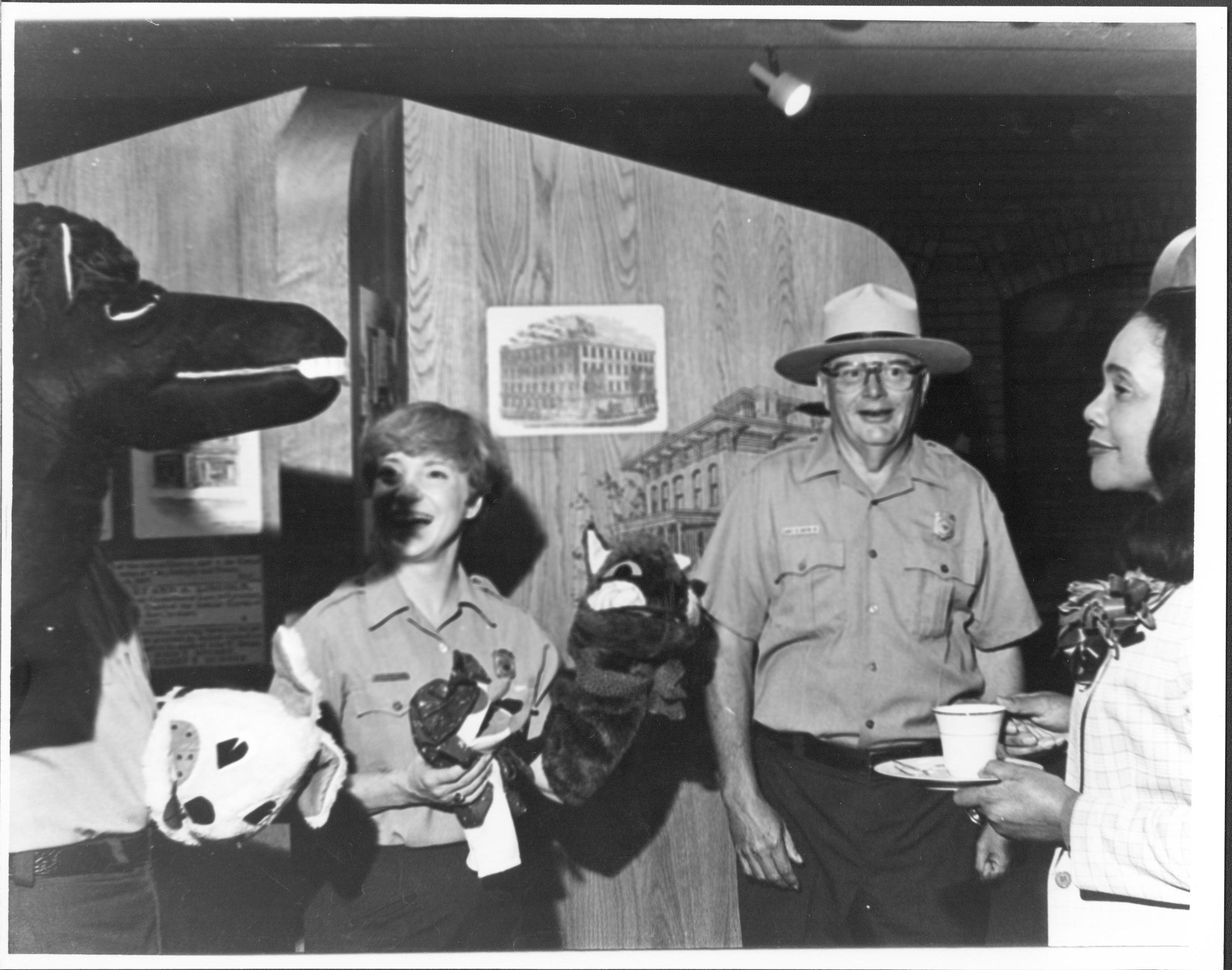 Two Rangers, one holding puppets.  Lincoln Home NHS- Coretta King Visit, 1000 King, visit, reception