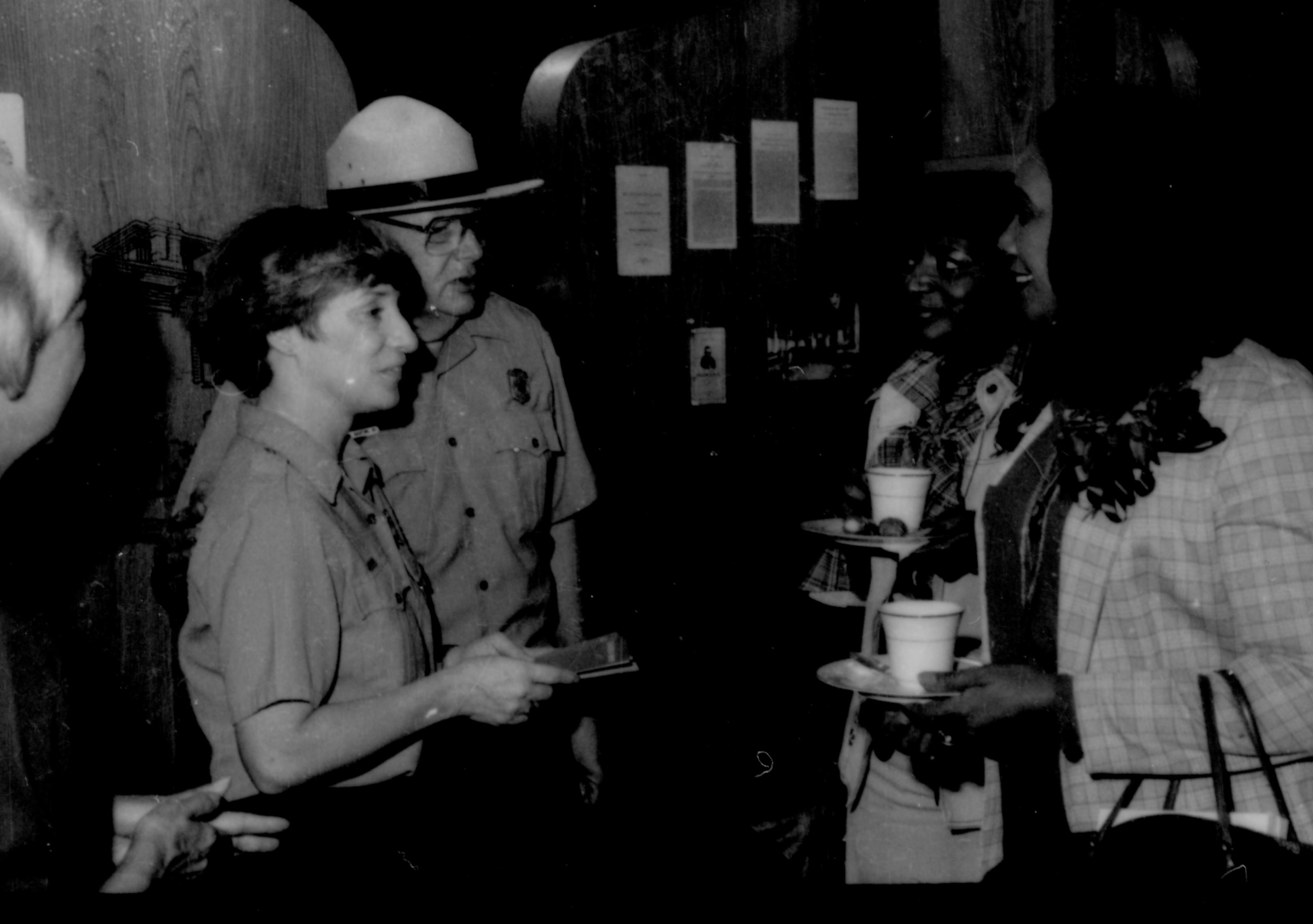 Two Rangers talking with ladies holding refreshments. Lincoln Home NHS- Coretta King Visit King, visit, reception