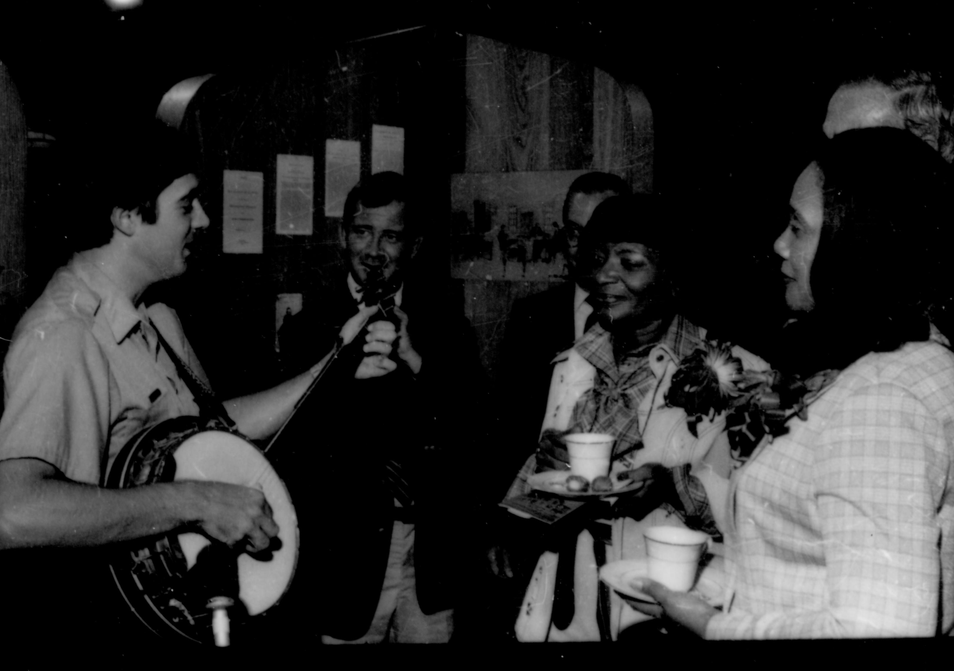 Ranger playing banjo. Lincoln Home NHS- Coretta King Visit King, visit, reception