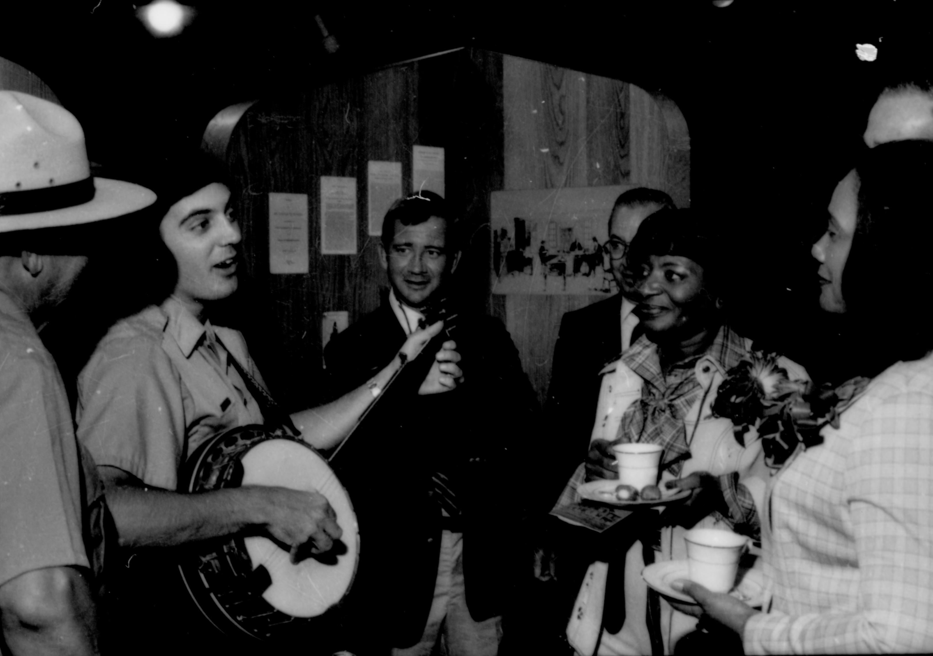 Ranger playing banjo. Lincoln Home NHS- Coretta King Visit King, visit, reception