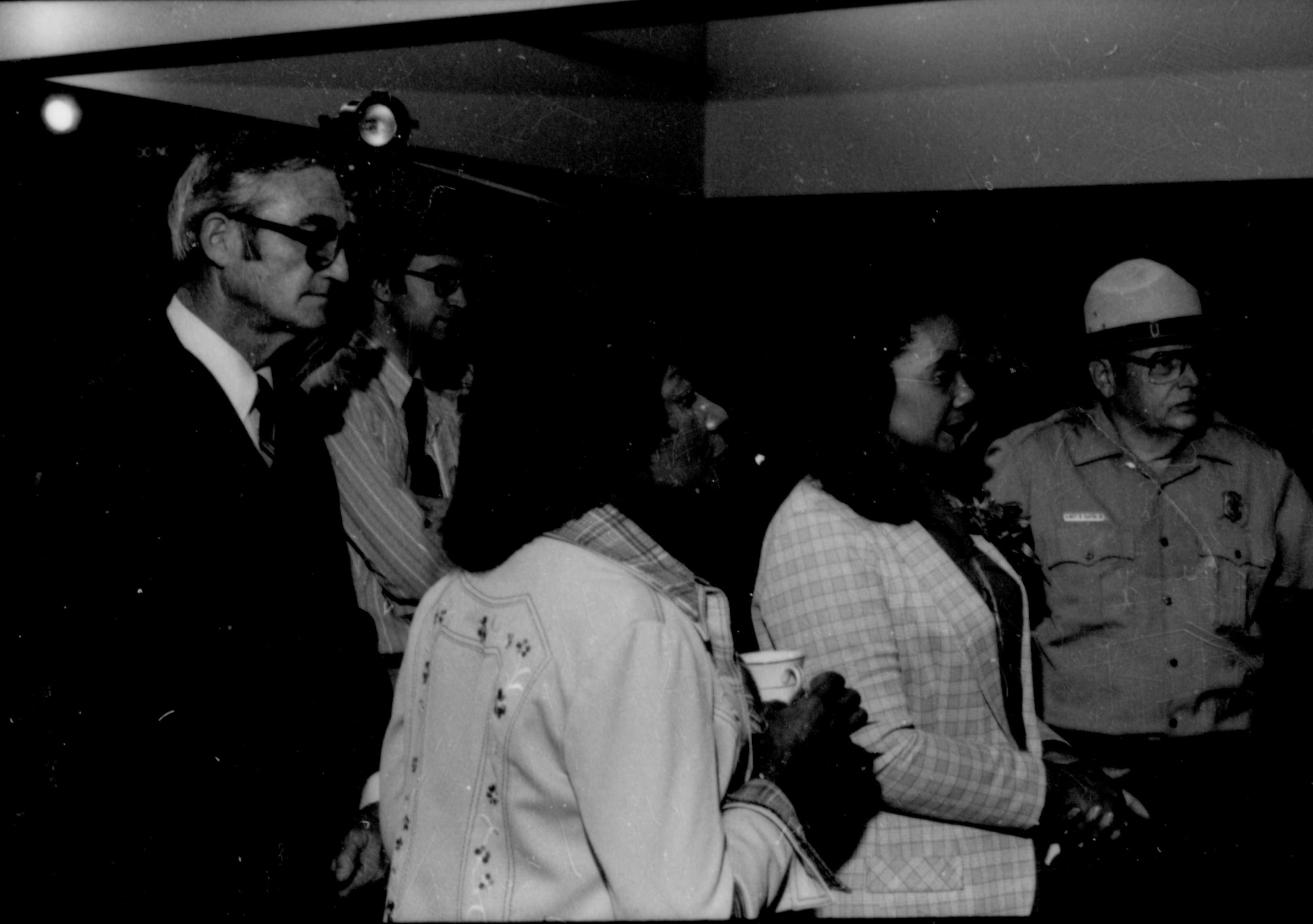 Two ladies & two men listening tp Ranger. Lincoln Home NHS- Coretta King Visit King, visit