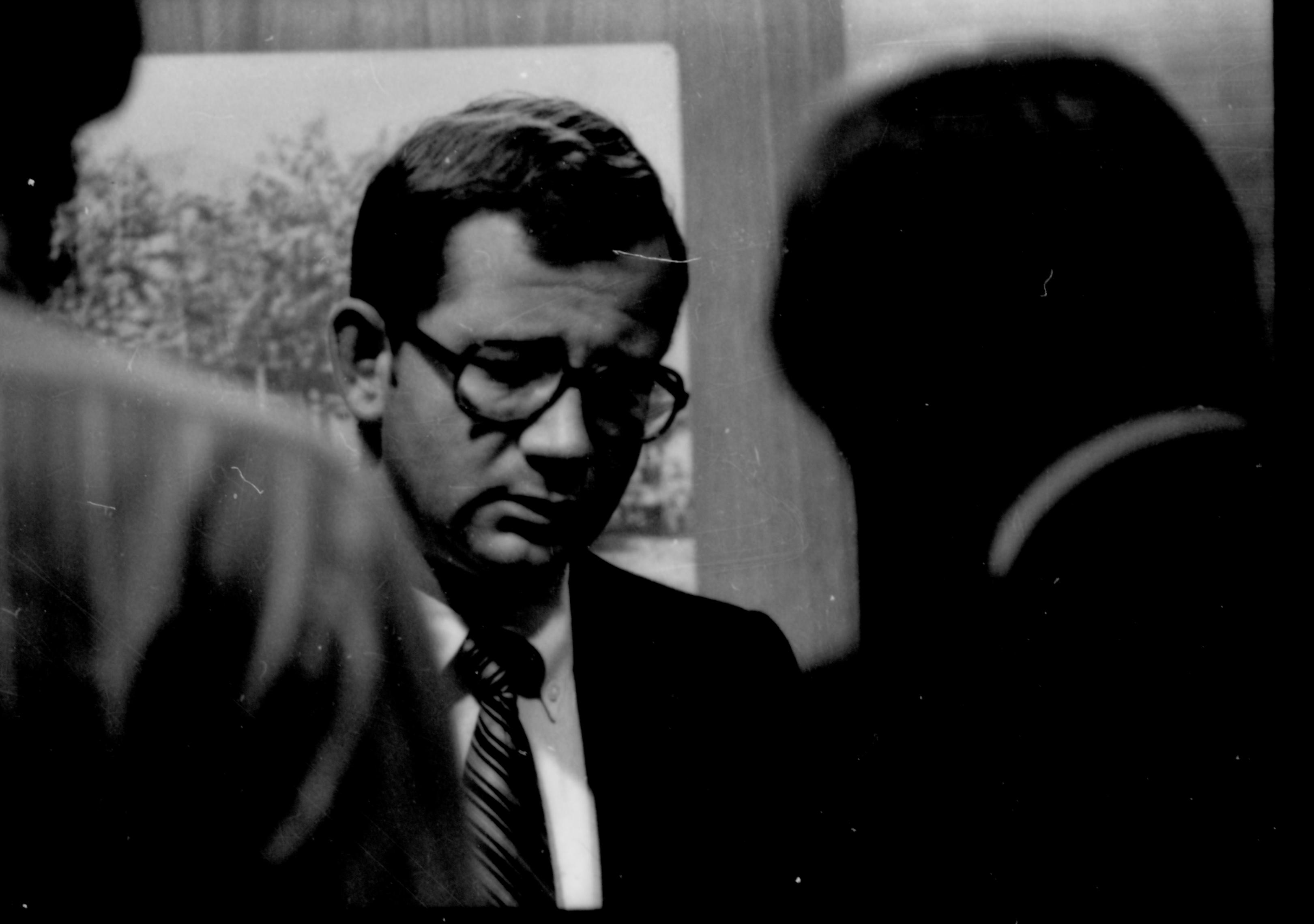 Man speaking with two other men (in front of photograph). Lincoln Home NHS- Coretta King Visit King, visit