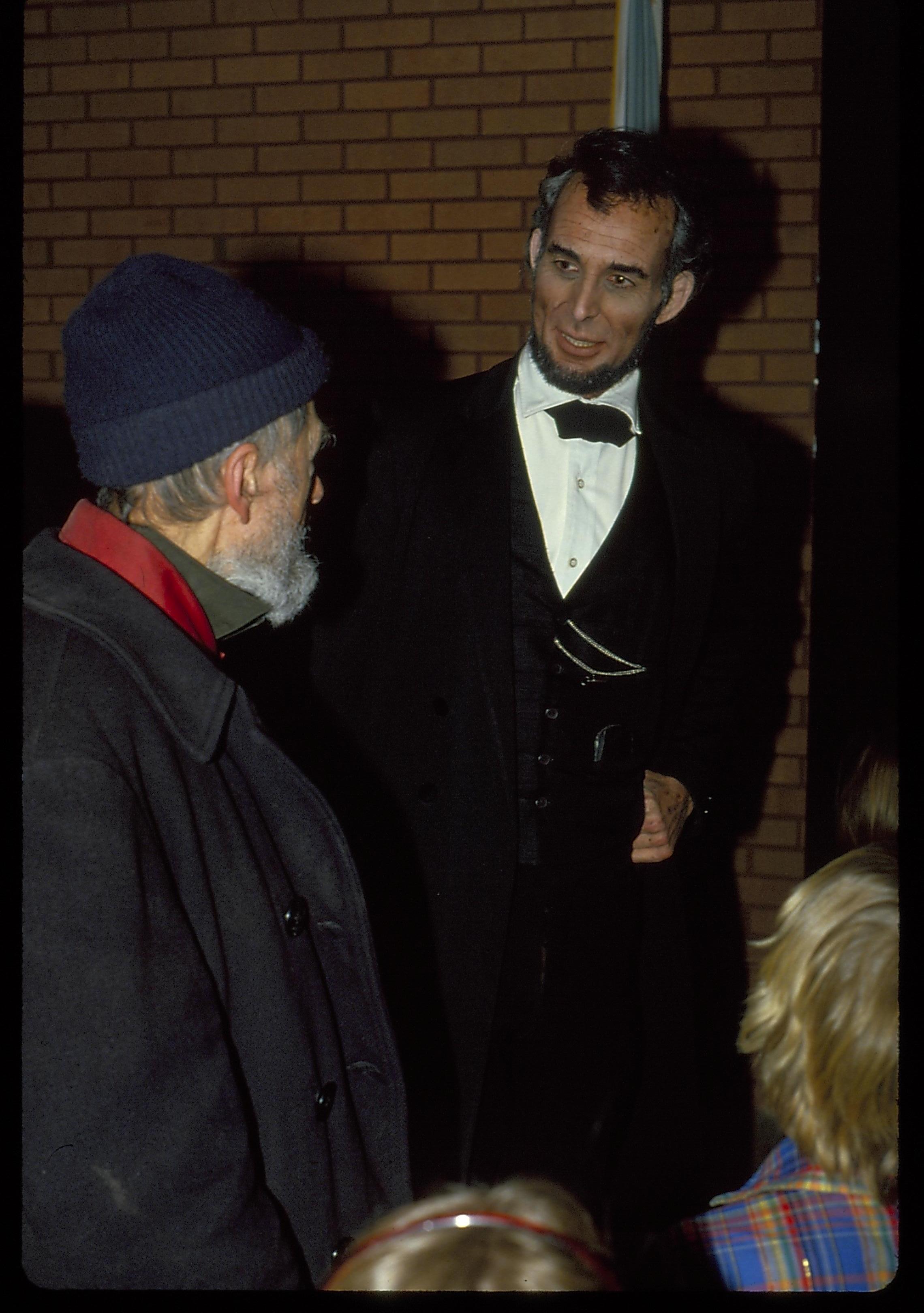 Lincoln impersonator and older man talking. Lincoln Home NHS- Lincoln's Birthday birthday, Lincoln, play