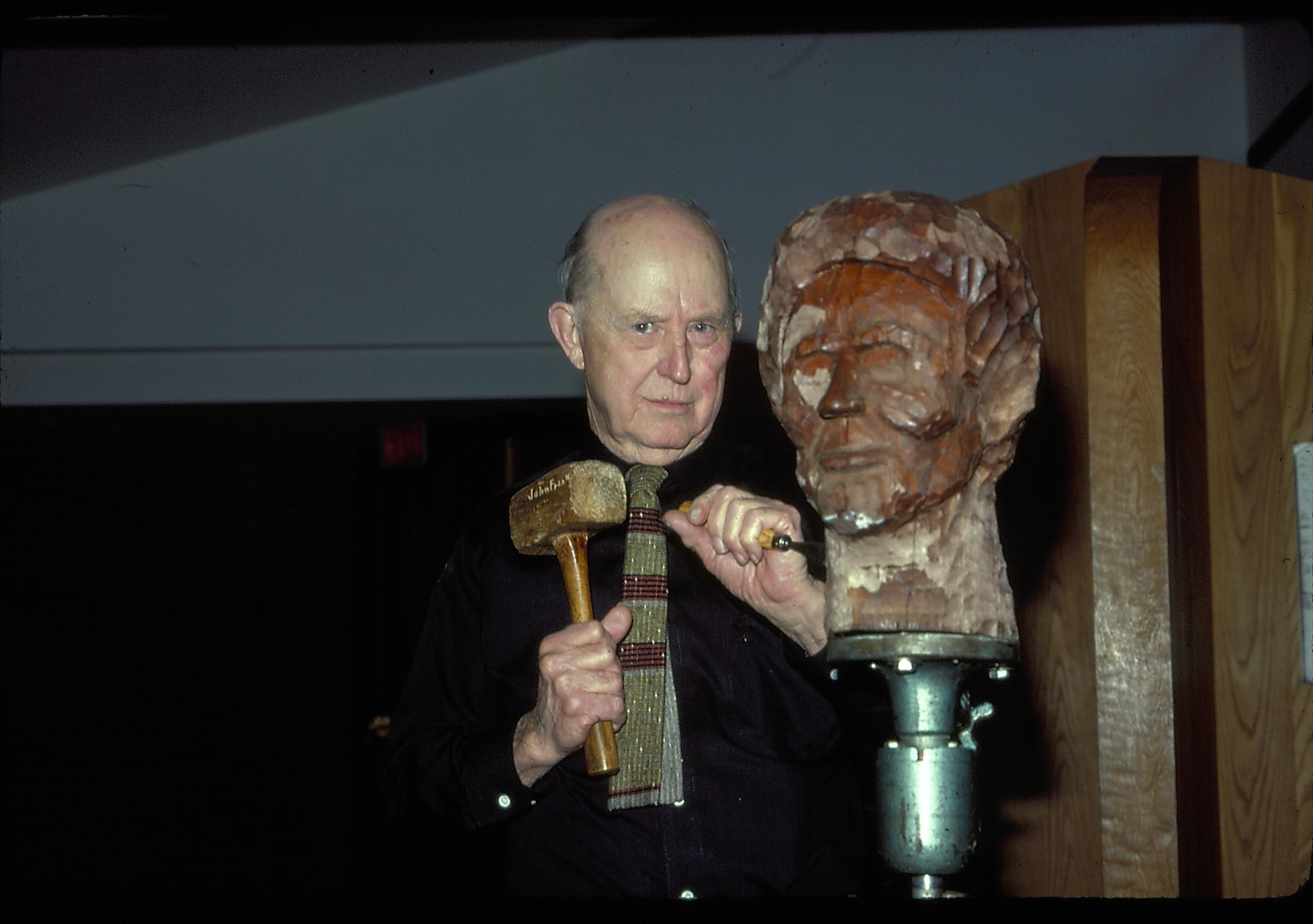 Man chiseling Lincoln bust. Lincoln Home NHS- Lincoln's Birthday 1984 birthday, Lincoln, bust, sculpture