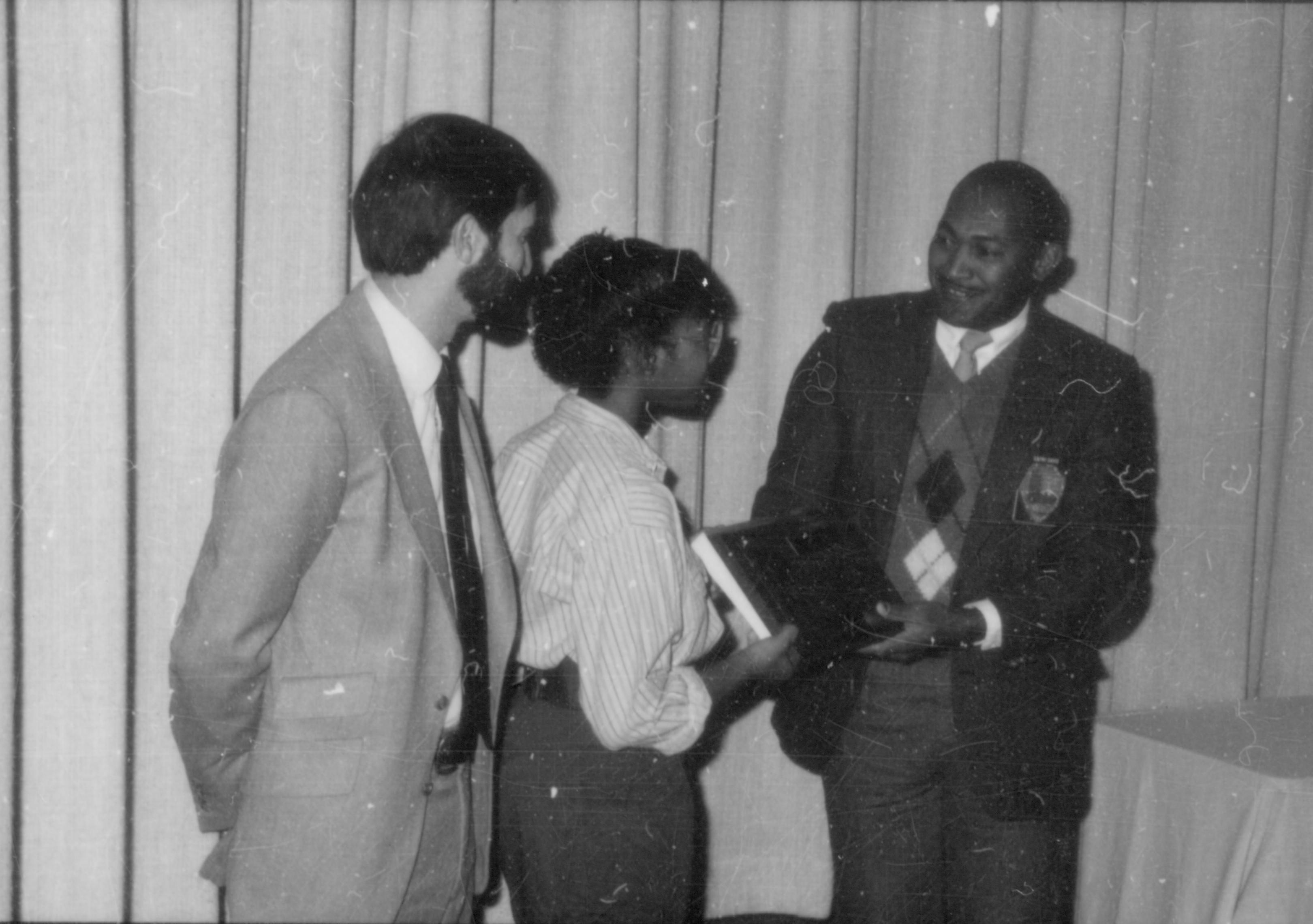 Award being given to young lady. Lincoln Home NHS- Lincoln's Birthday 1988, 26 birthday, Lincoln, award