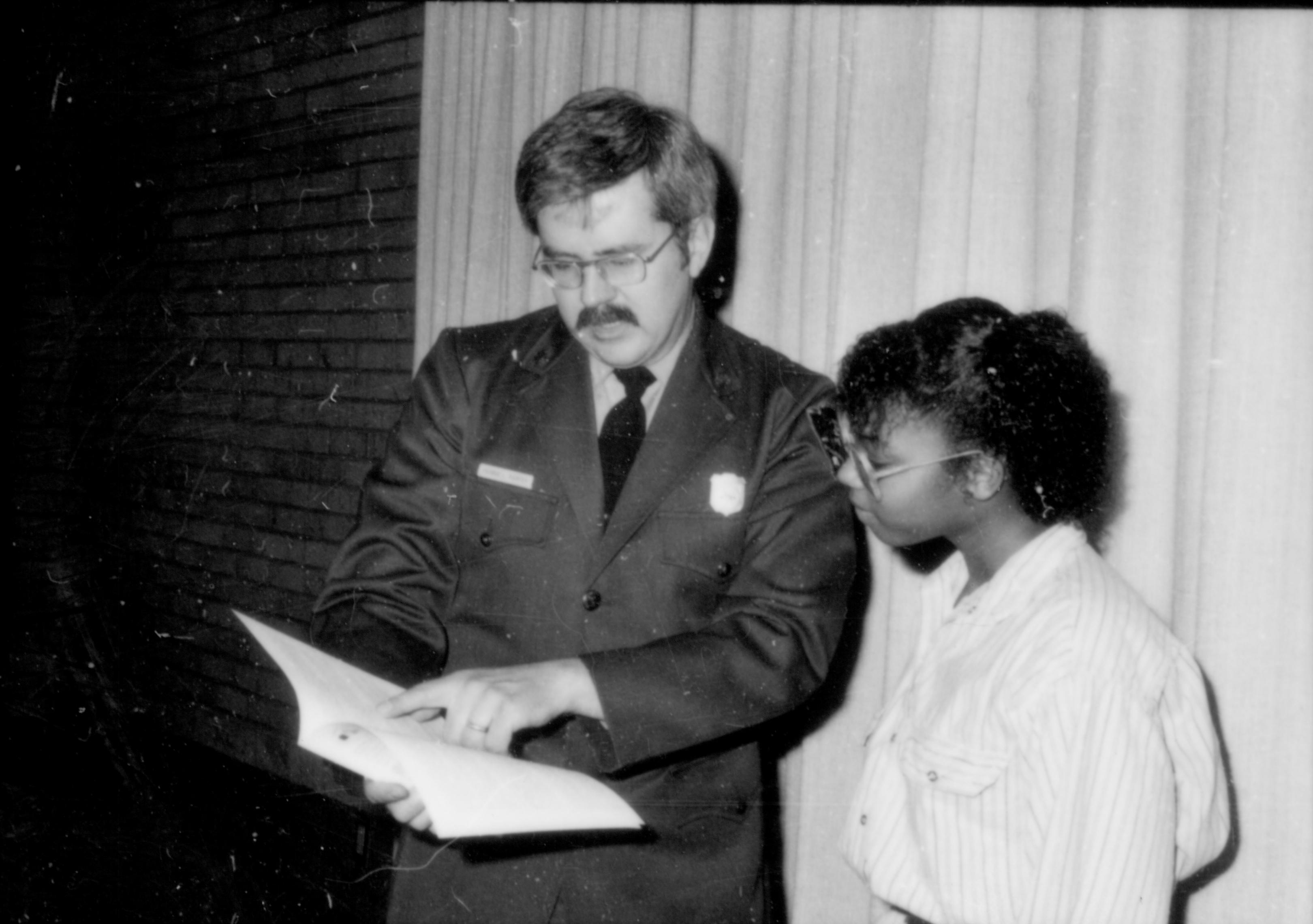 Young lady being shown book by Ranger. Lincoln Home NHS- Lincoln's Birthday 1988, 26 birthday, Lincoln, award