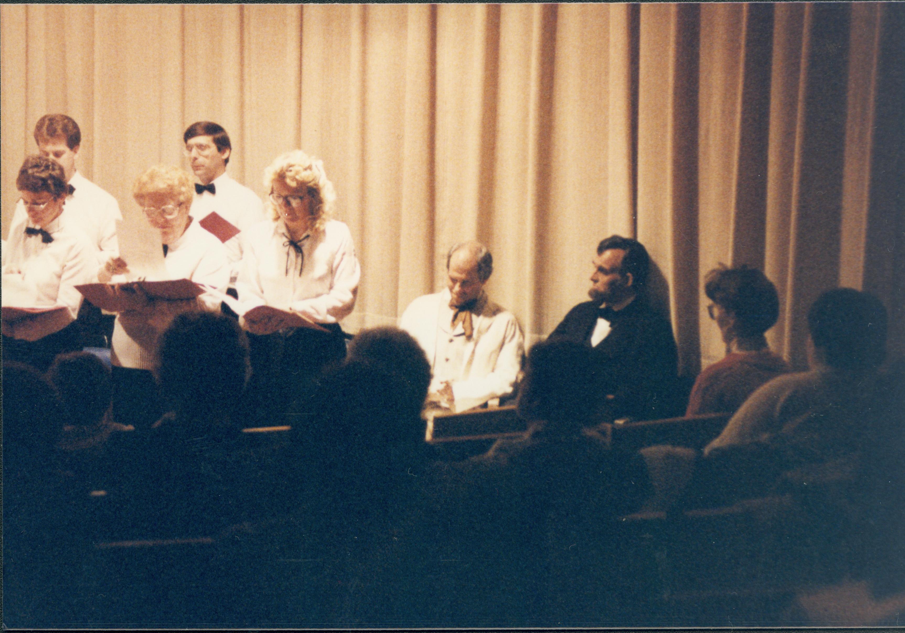 Choir and impersonators (seated). Lincoln Home NHS- Lincoln's Birthday 1988 birthday, Lincoln, Douglas