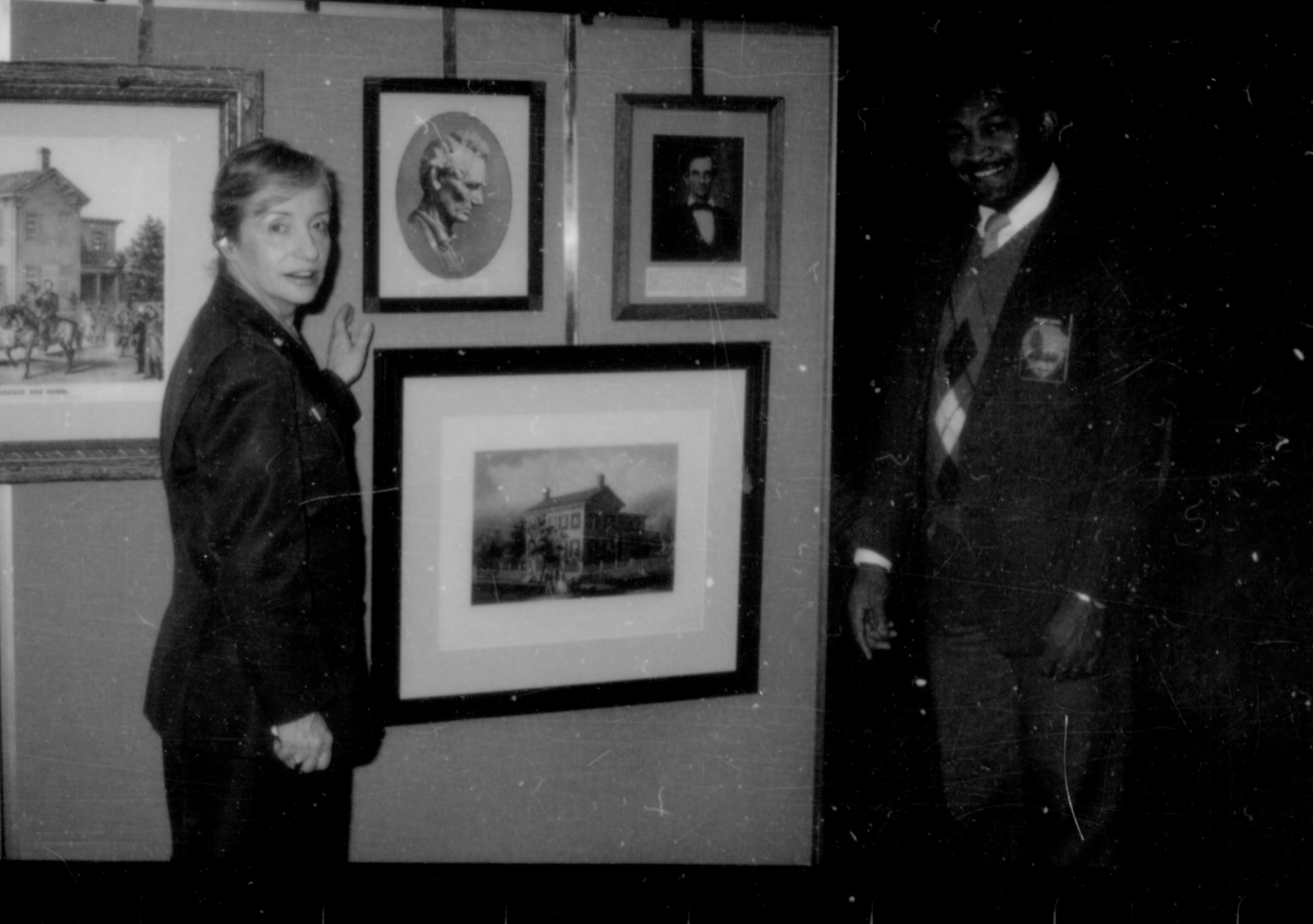 Two staff in front of picture of home. Lincoln Home NHS- Lincoln's Birthday 1988, 26 birthday, Lincoln, art, exhibit