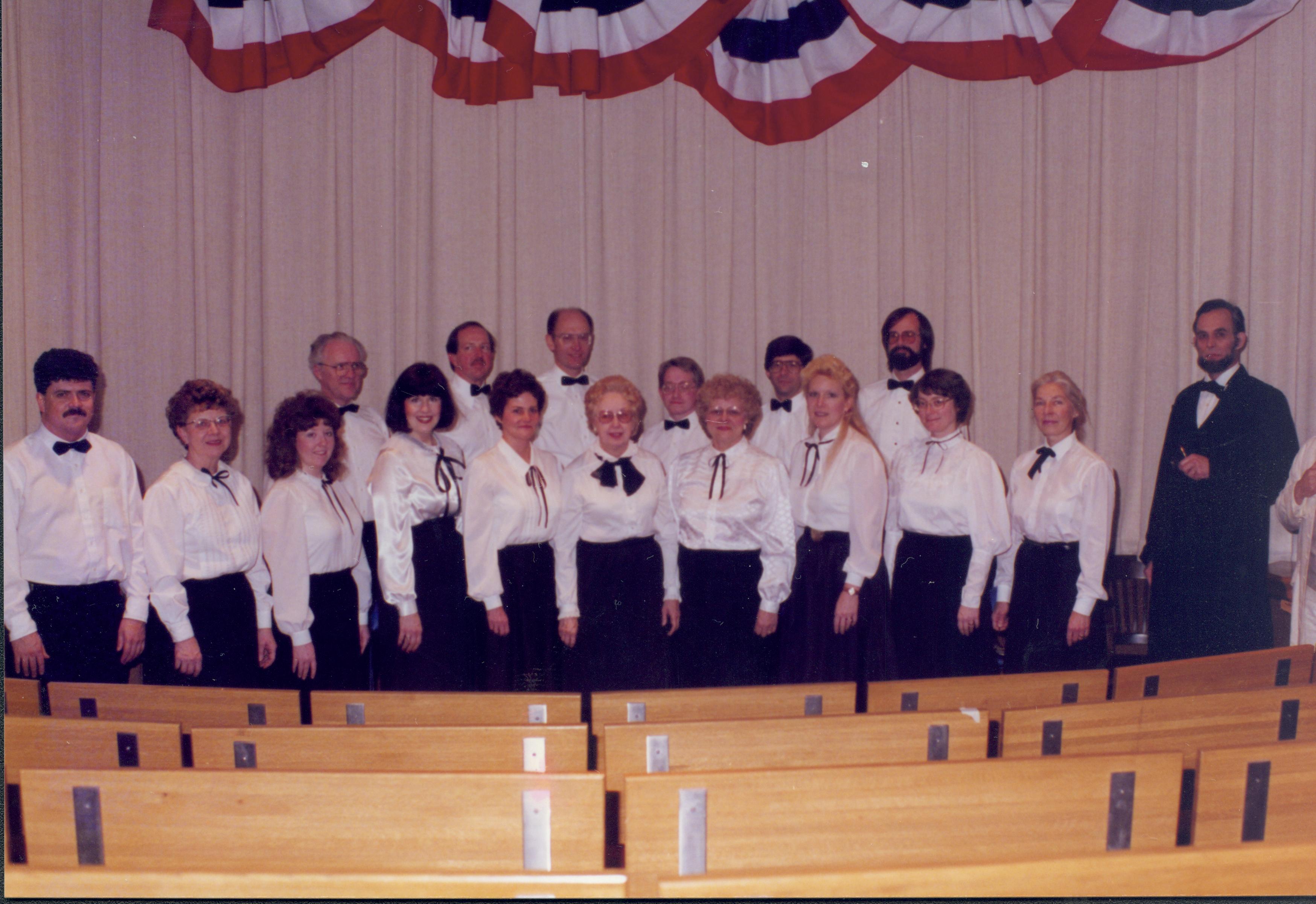 Choir standing in front of curtain with impersonators. Lincoln Home NHS- Lincoln's Birthday 1988 birthday, Lincoln, Douglas