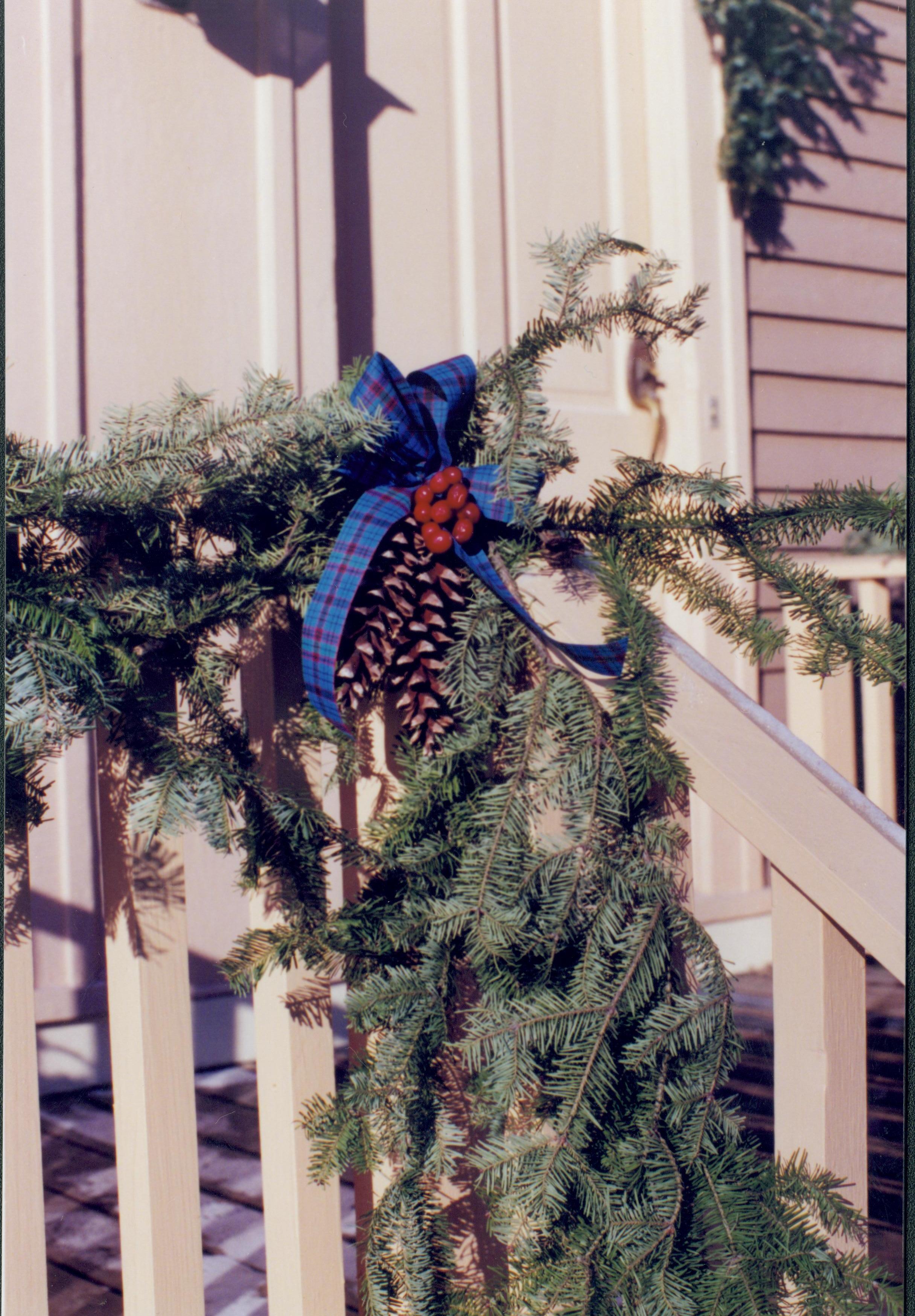 Lincoln Home NHS- Christmas in Lincoln Neighborhood Looking north west, Christmas garland on Miller house porch rail. Detail. Christmas, neighborhood, Miller, porch, rail, detail, decor, garland