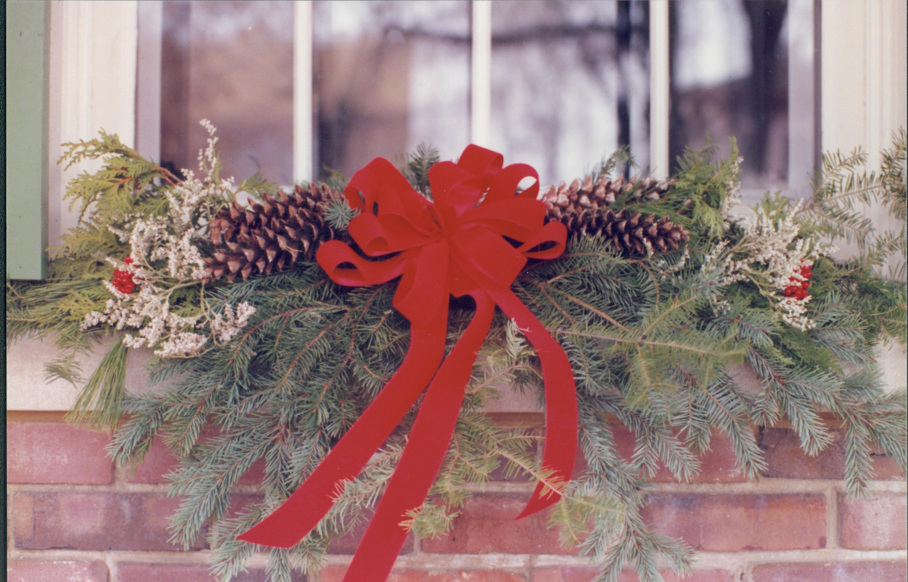 Lincoln Home NHS- Christmas in Lincoln Neighborhood Christmas decor on widow sill. Detail. Christmas, neighborhood, wreath, decor, window, detail