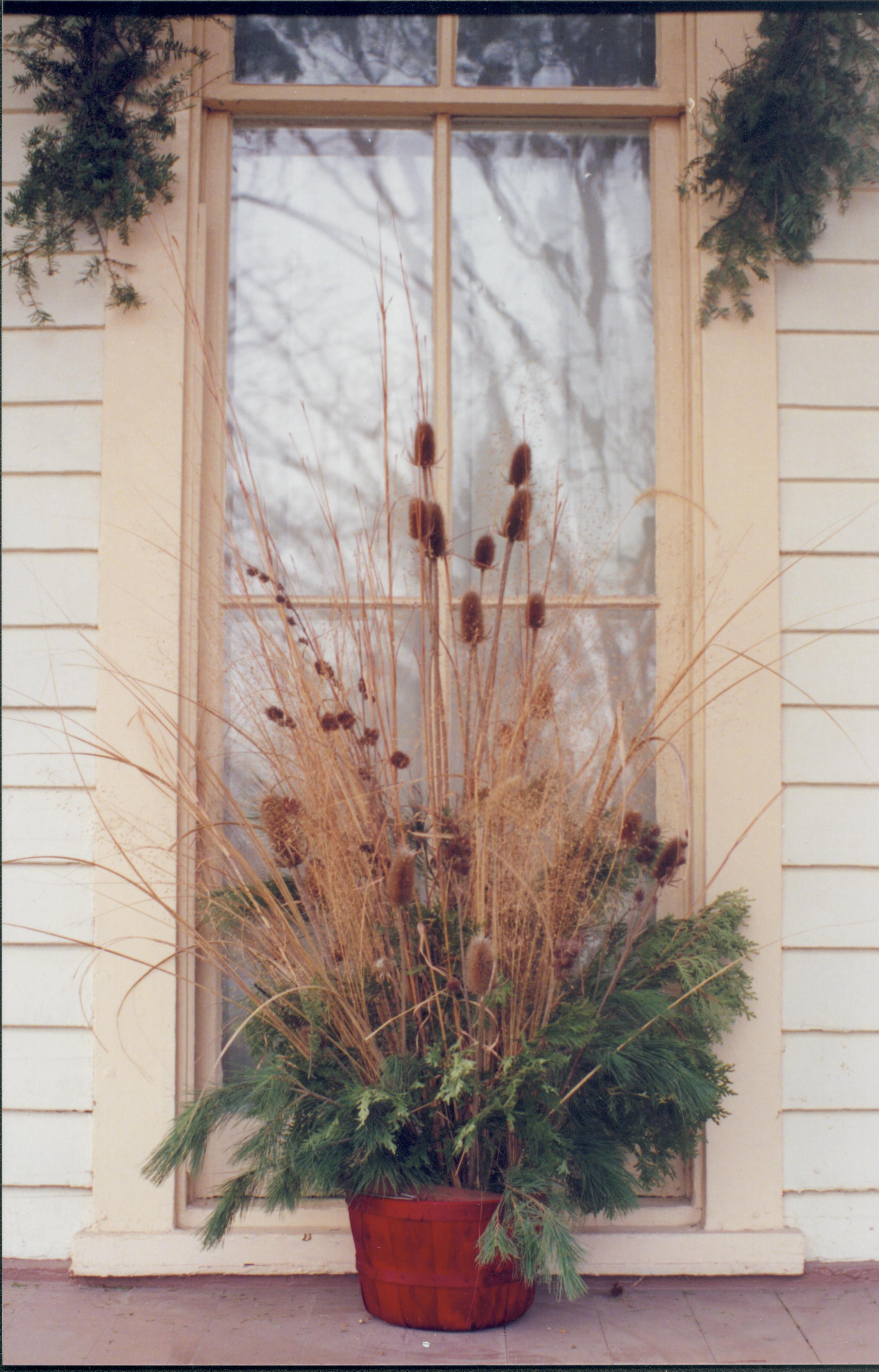 Lincoln Home NHS- Christmas in Lincoln Neighborhood Christmas decor on porch. Detail Christmas, neighborhood, decor, porch, garland, detail