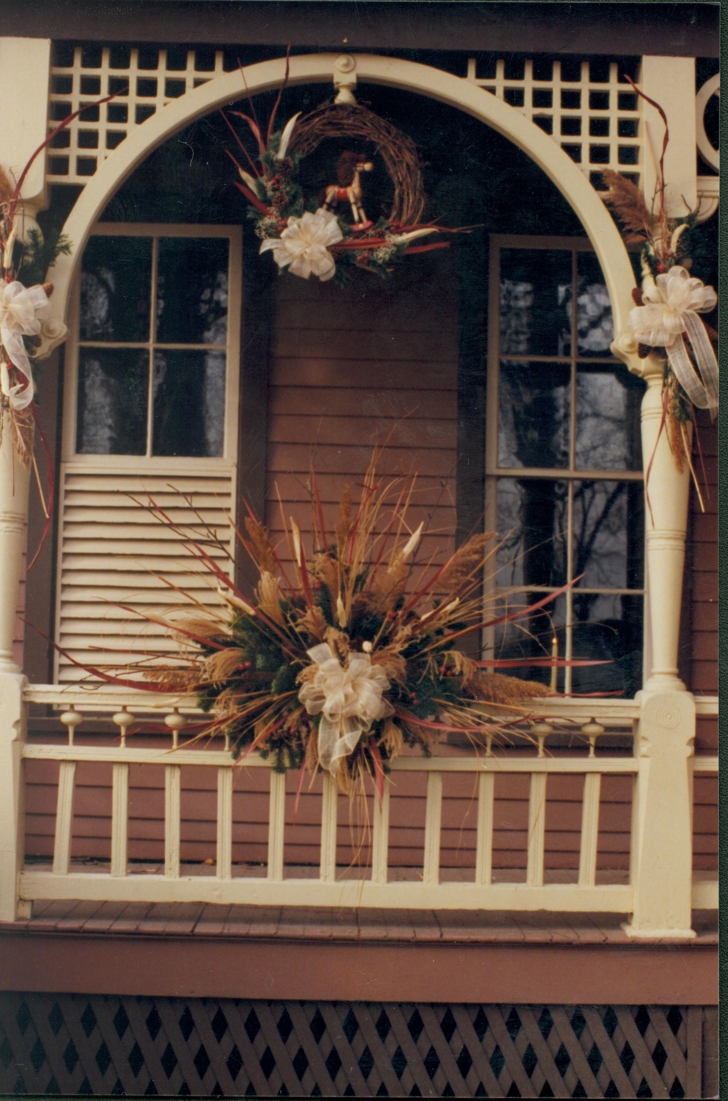 Lincoln Home NHS- Christmas in Lincoln Neighborhood Looking west, Christmas decor on Dean house porch. Detail. Christmas, neighborhood, Dean, detail, decor, wreath, garland