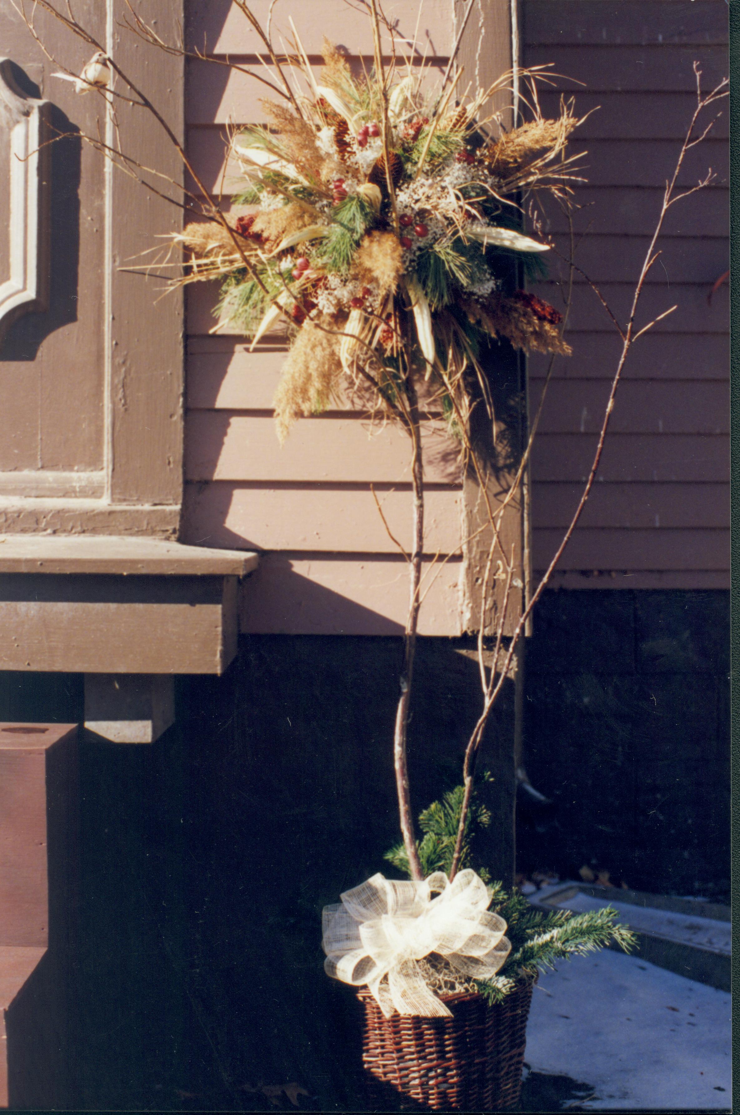 Lincoln Home NHS- Christmas in Lincoln Neighborhood Christmas decor near foundation of house. Detail. Christmas, neighborhood, decor, foundation