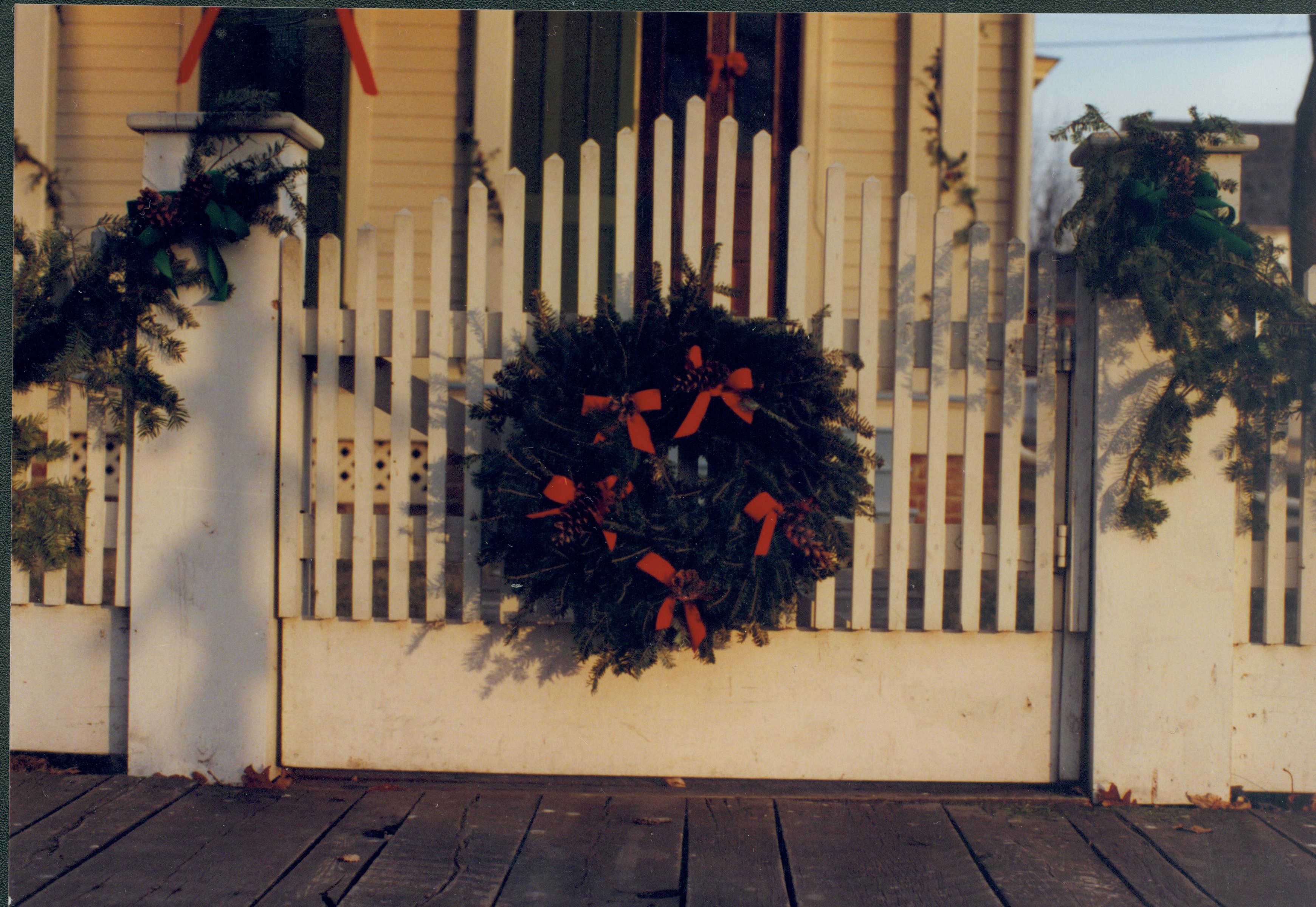 Lincoln Home NHS- Christmas in Lincoln Neighborhood Christmas decor on fence. Detail. Christmas, neighborhood, wreath, garland, decor, detail