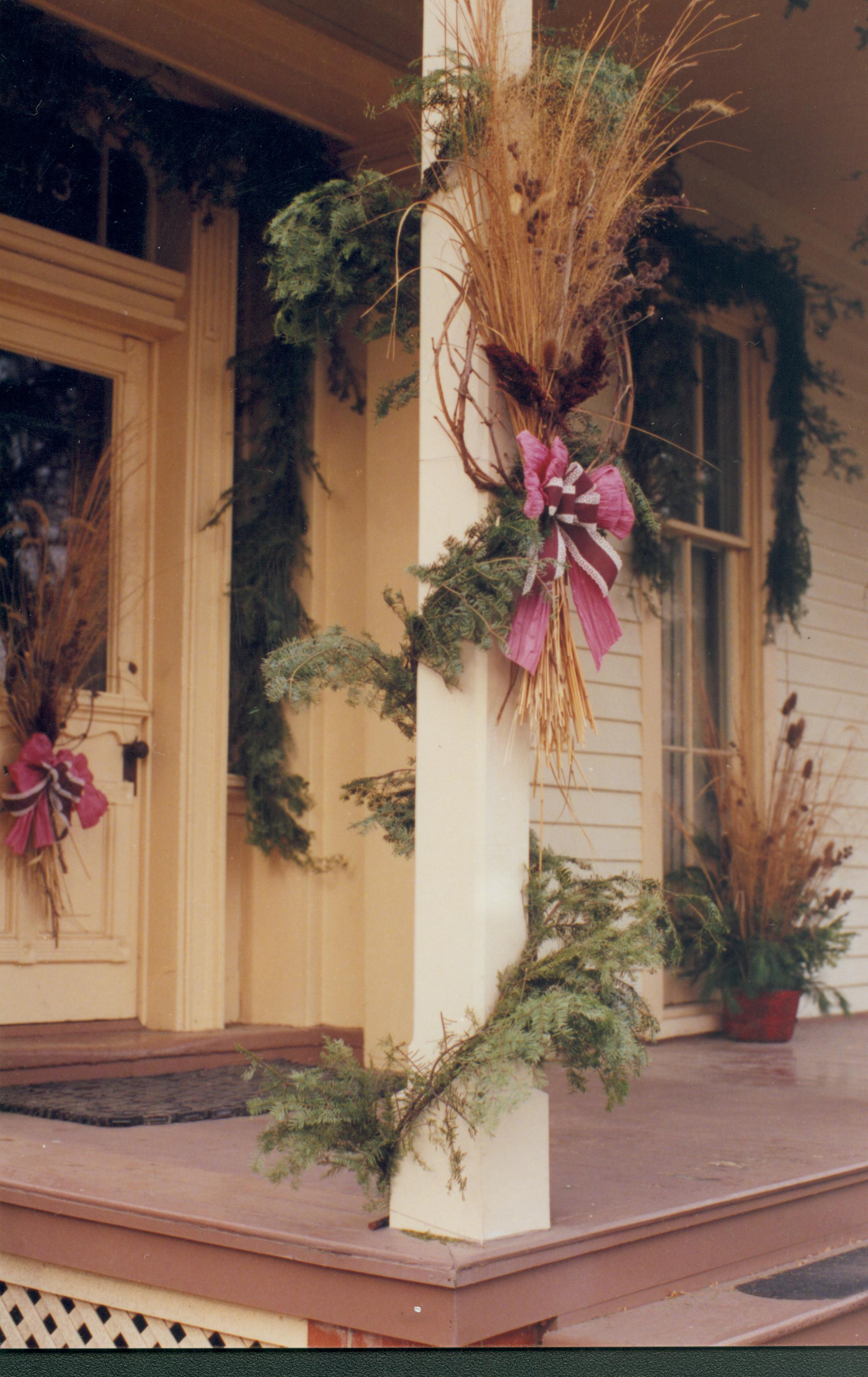 Lincoln Home NHS- Christmas in Lincoln Neighborhood Looking north west, Christmas decor on Rosenwald house and porch. Detail. Christmas, neighborhood, decor, garland, Lyon, Rosenwald, porch