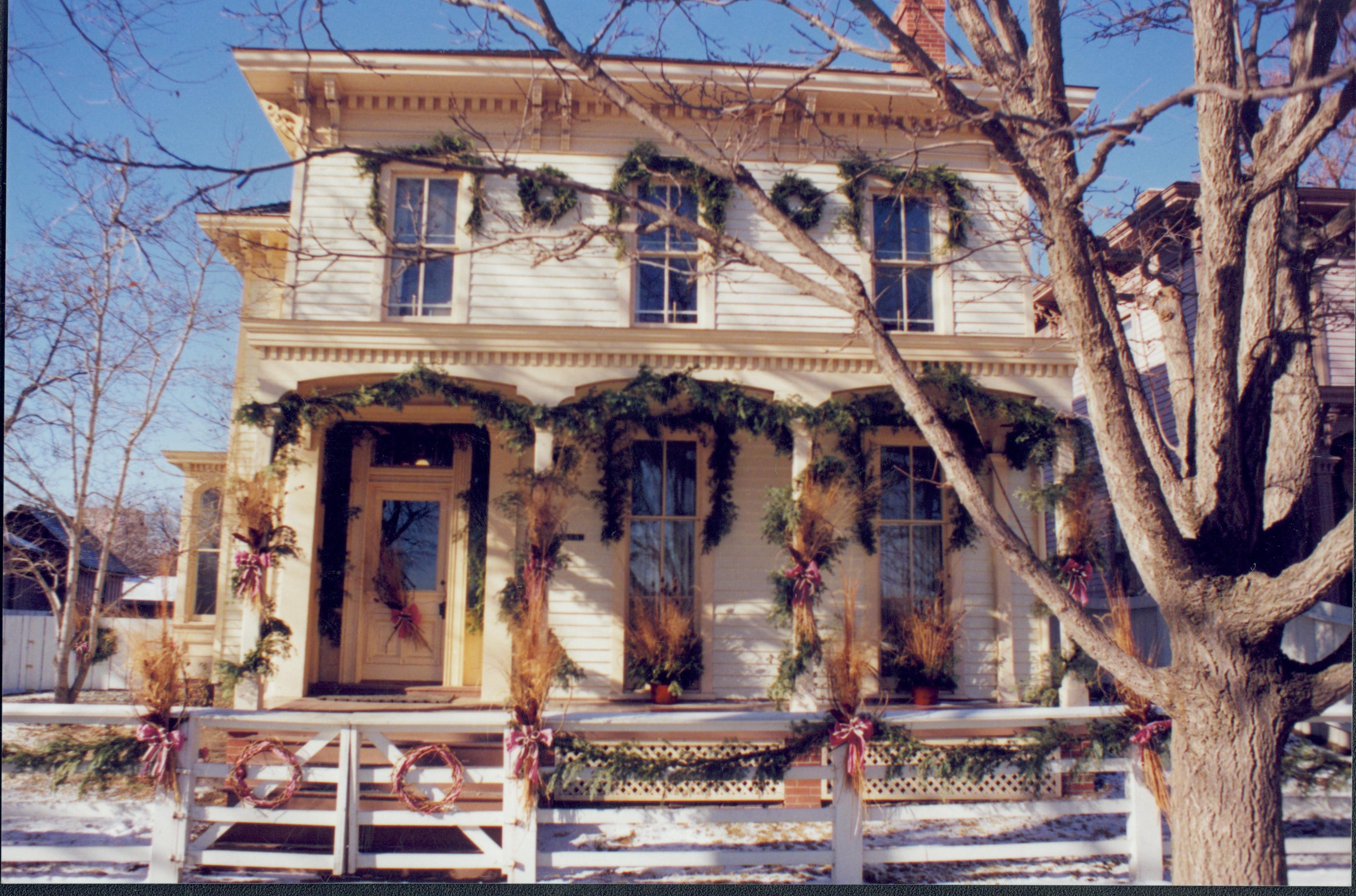 Lincoln Home NHS- Christmas in Lincoln Neighborhood Looking west from 8th Street, Christmas decor on Rosenwald house. Christmas, neighborhood, Lyon, wreath, Rosenwald, garland