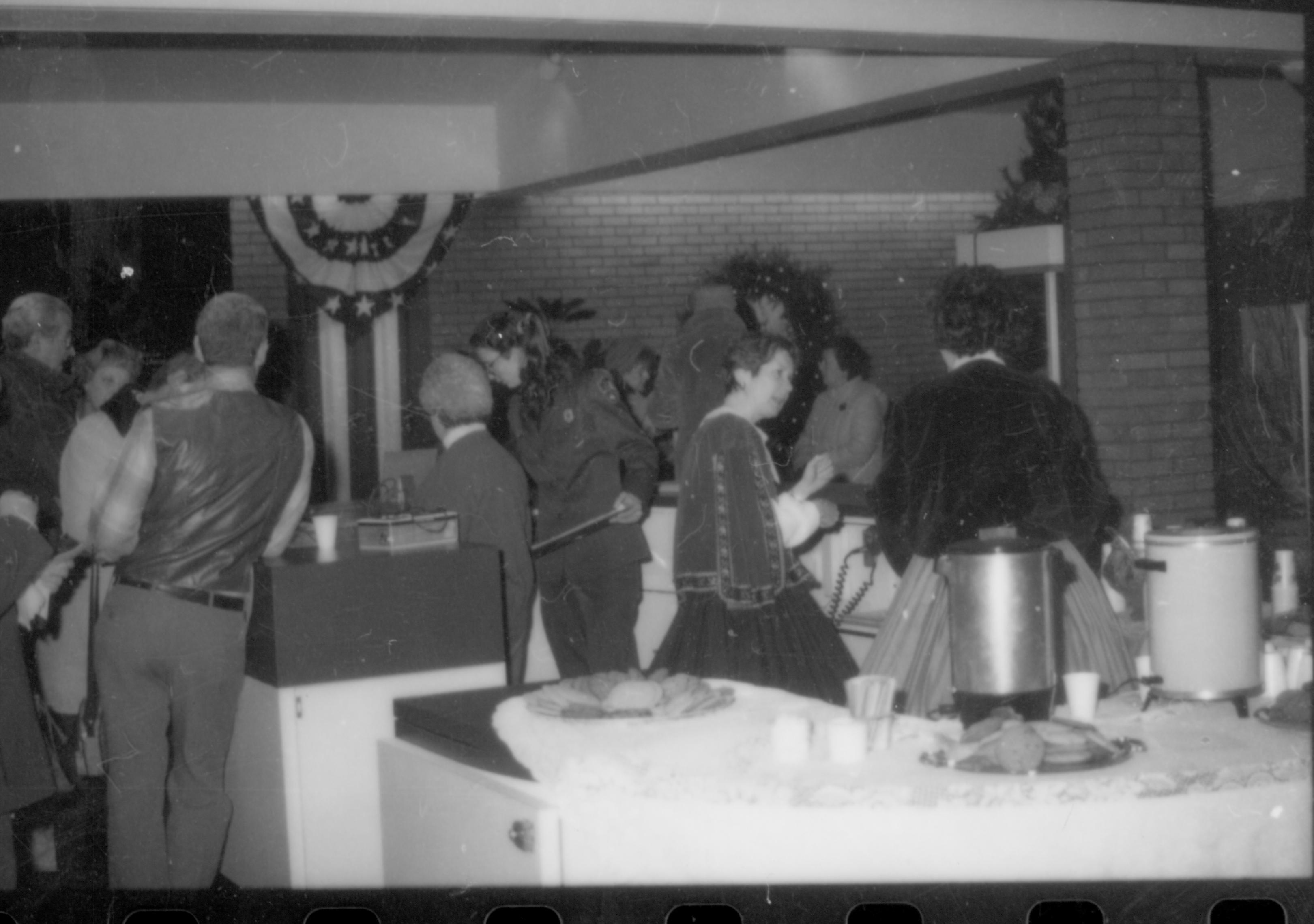 Lincoln Home NHS- Christmas in Lincoln Neighborhood Staff and volunteers serving refreshments in Visitor Center lobby. exhibit, ceremony, Visitor, Center, lobby, Christmas, refreshments, staff, costume