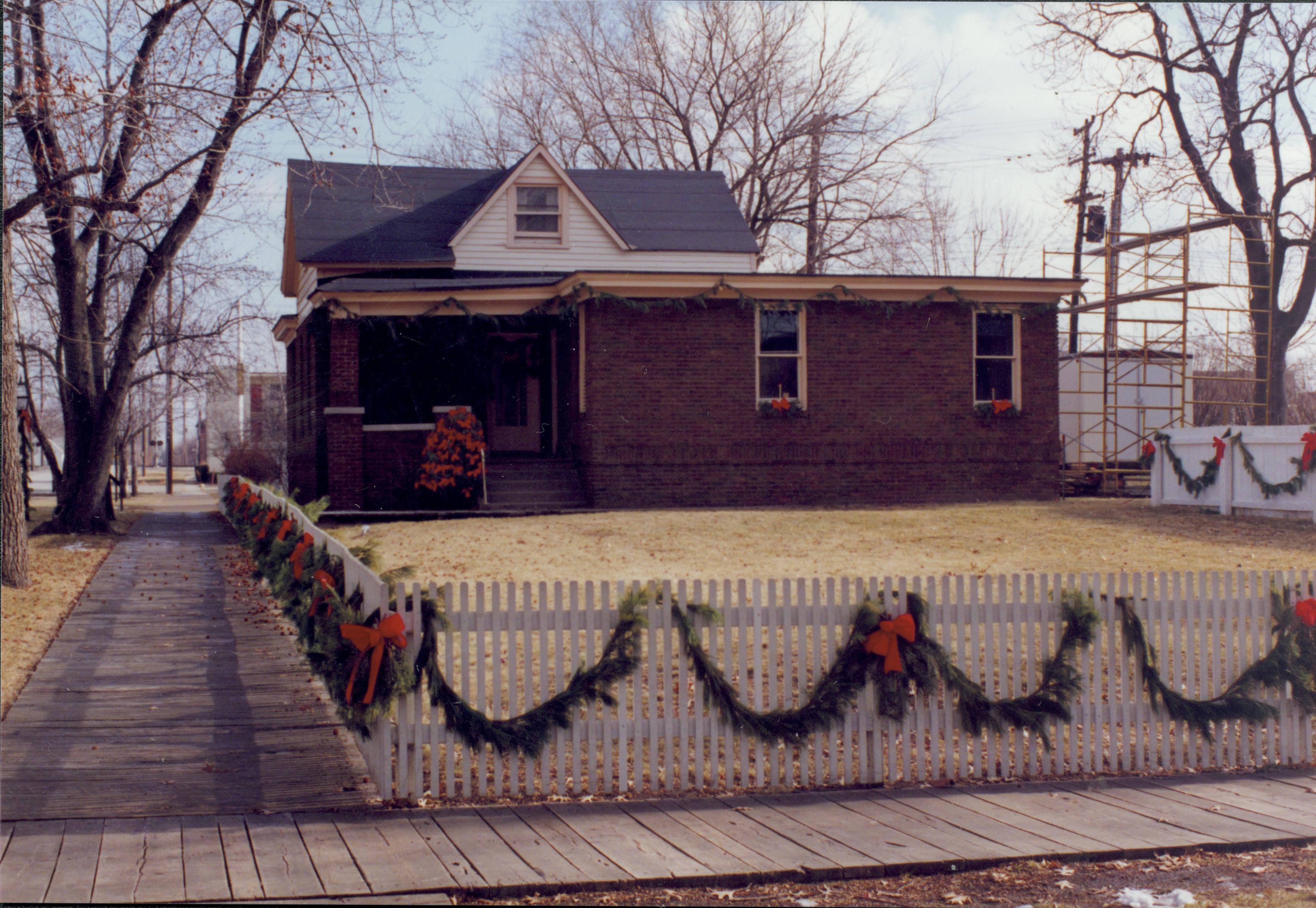 Lincoln Home NHS- Christmas in Lincoln Neighborhood  Looking east from 8th Street toward Arnold house and lot. Pre-restoration. Christmas, neighborhood, Arnold, decoration