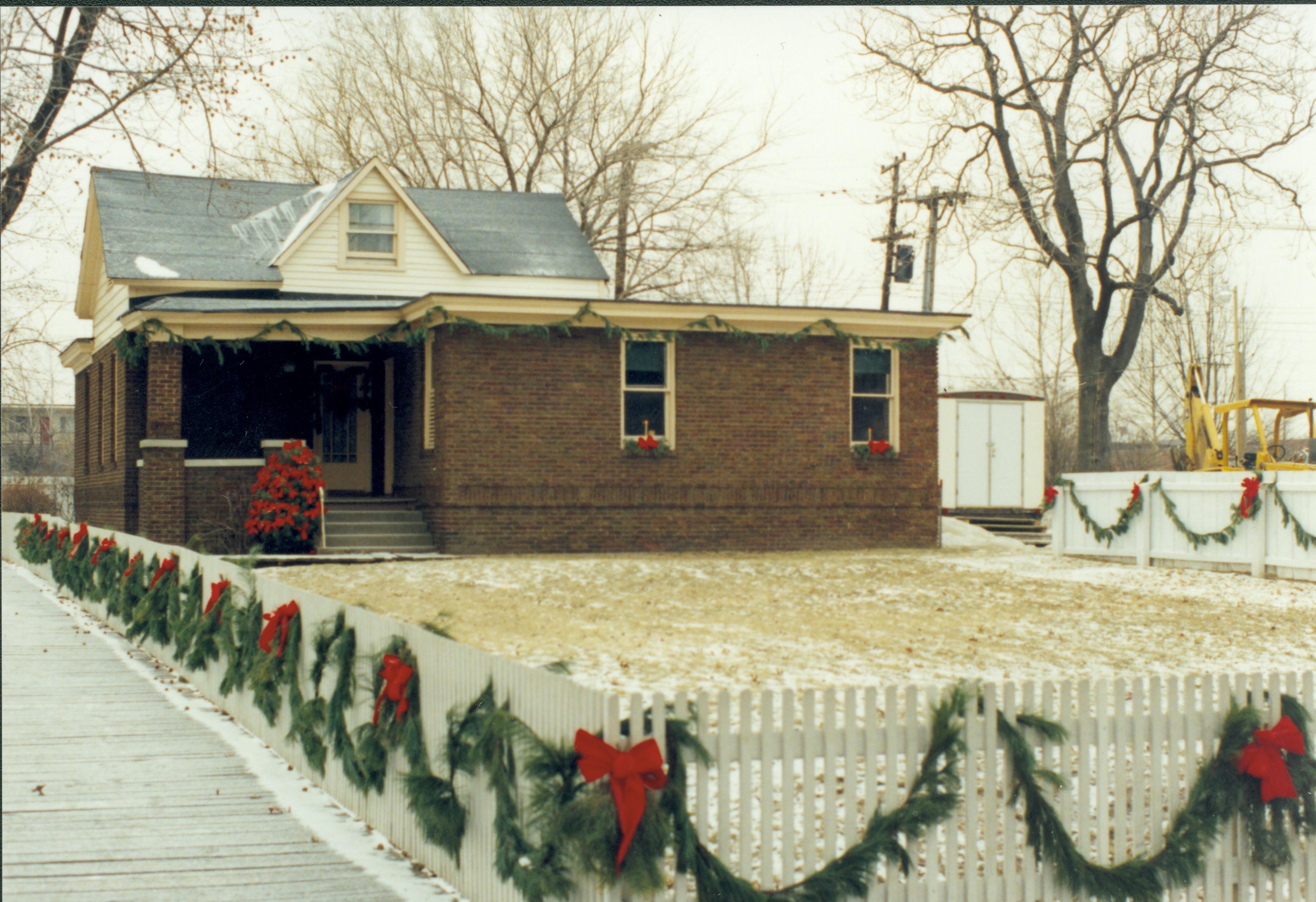 Lincoln Home NHS- Christmas in Lincoln Neighborhood  Looking east from 8th Street toward Arnold house and lot. Pre-restoration. Christmas, neighborhood, Arnold, decoration