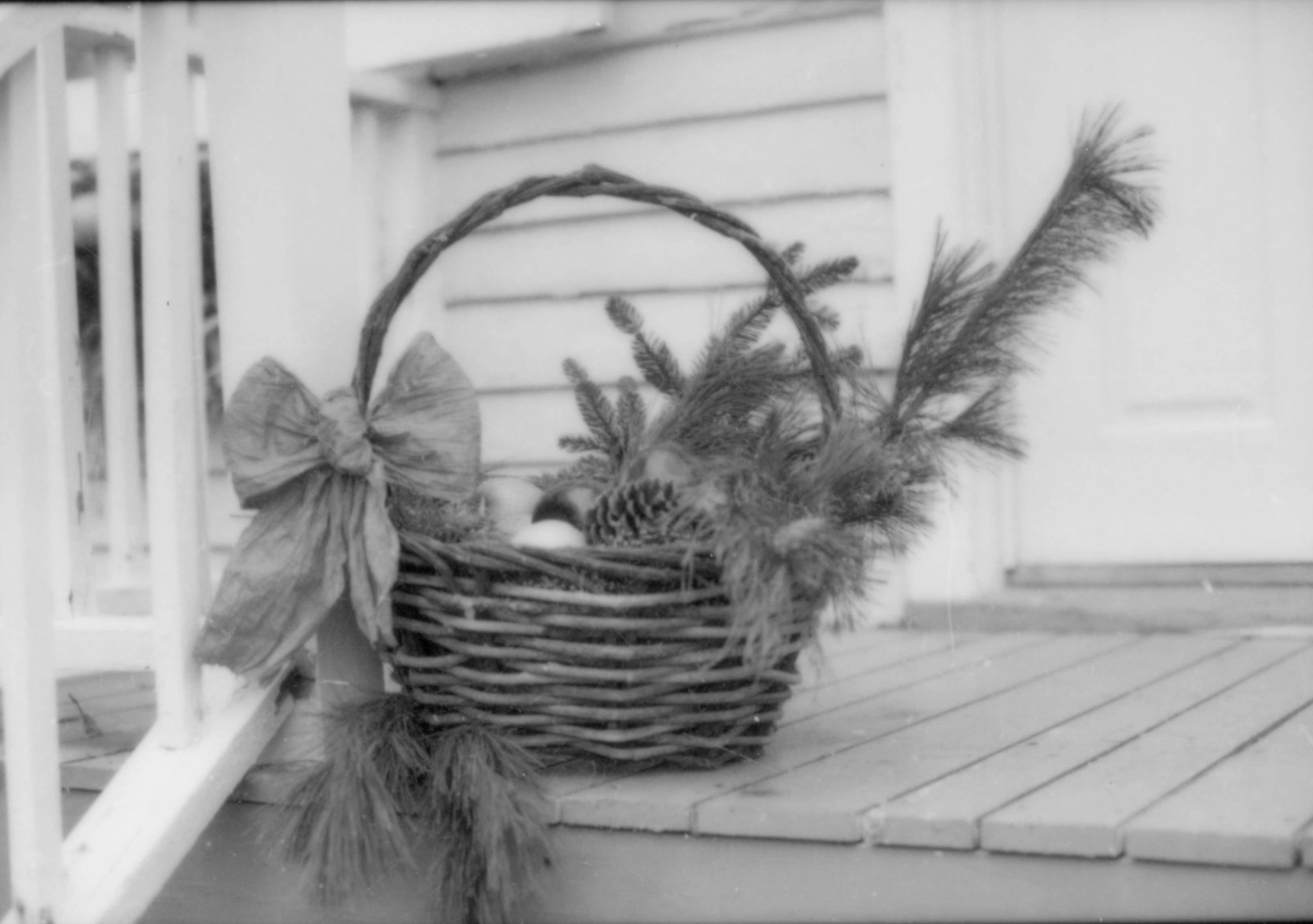 Lincoln Home NHS- Christmas in Lincoln Neighborhood Looking north east, Christmas basket on porch of Corneau house. Detail. Christmas, decorations, neighborhood, decor, detail, porch, Corneau