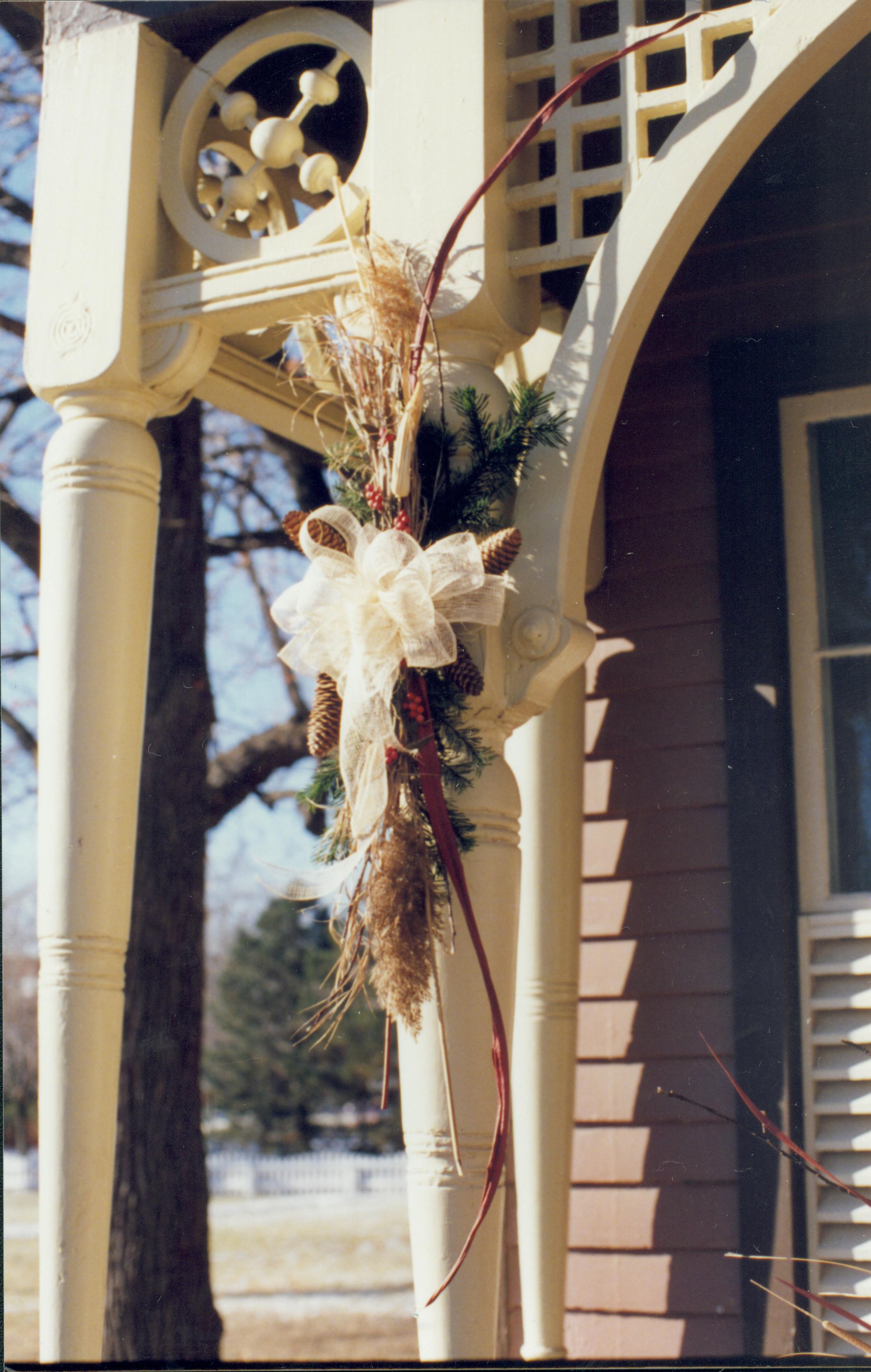 Lincoln Home NHS- Christmas in Lincoln Neighborhood Looking south west toward porch detail on Dean house. Christmas, neighborhood, Dean, decoration, detail