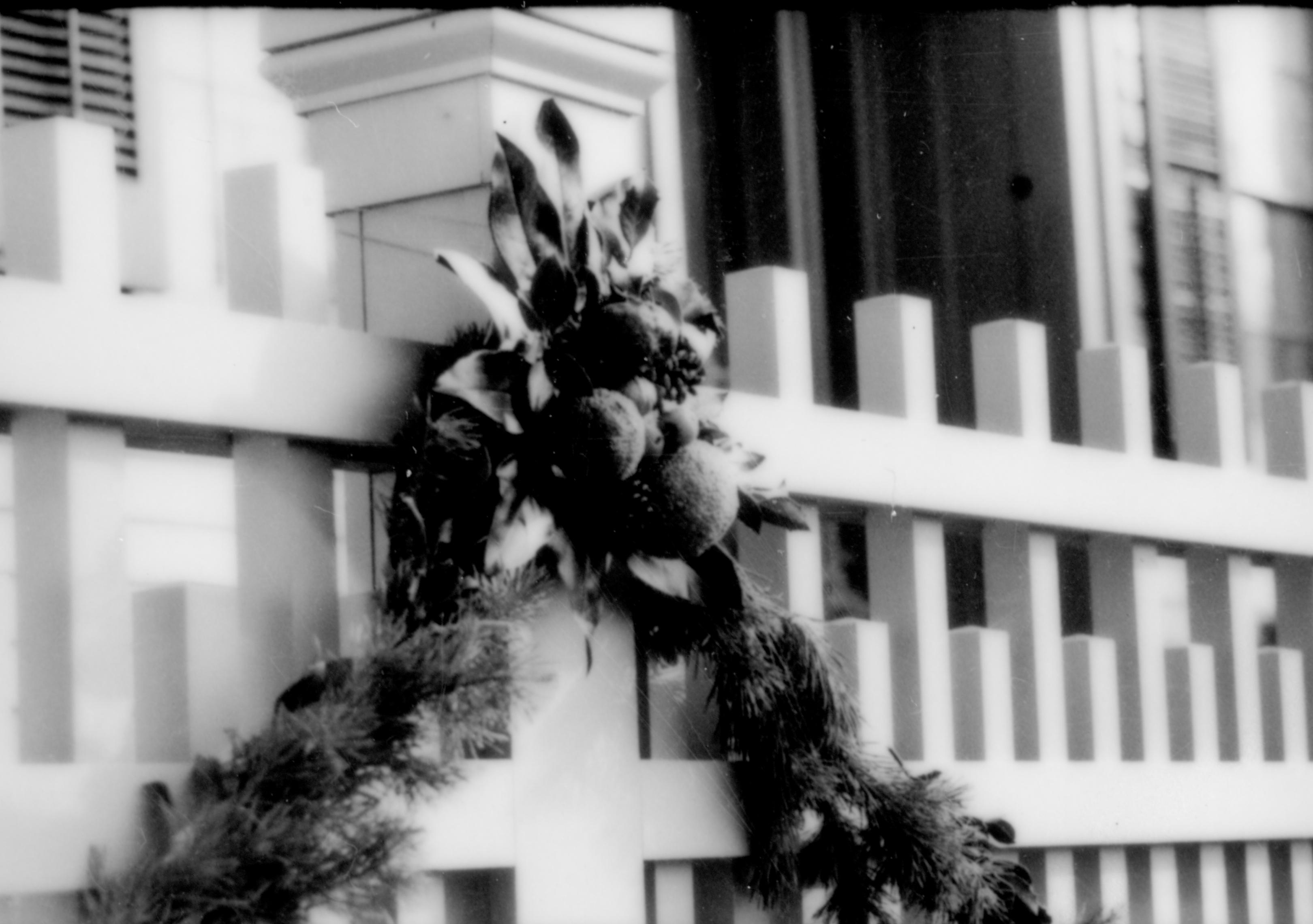 Lincoln Home NHS- Christmas in Lincoln Neighborhood Looking south east from plaza, Lincoln home fence decorated for Christmas. Detail. Christmas, neighborhood, decorations, garland, decor, fence, Lincoln