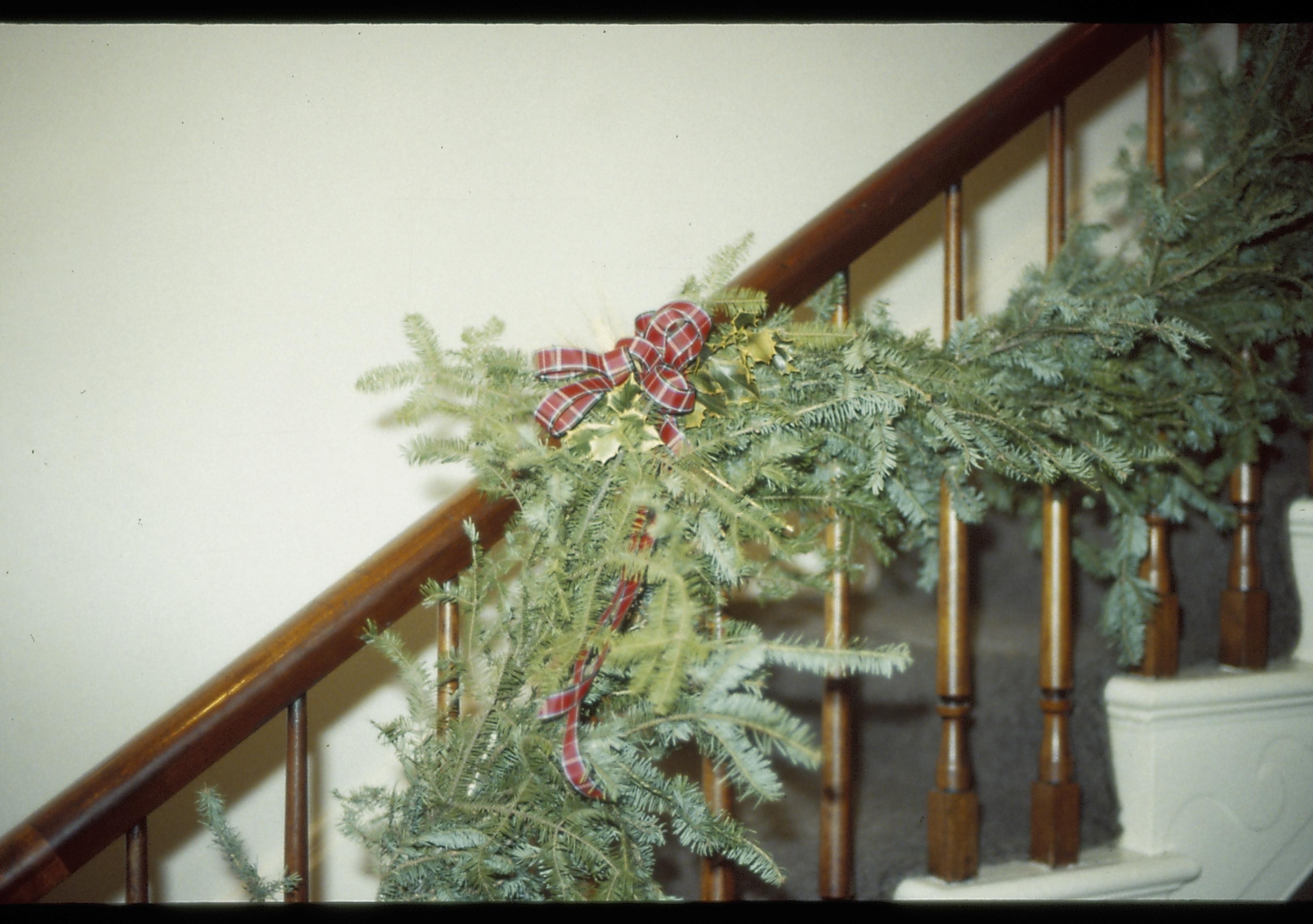 Lincoln Home NHS- Christmas in Lincoln Neighborhood Christmas garland on interior stairwell hand rail. Rosenwald (?) Christmas, decorations, garland, handrail, Rosenwald, Lyon, decor