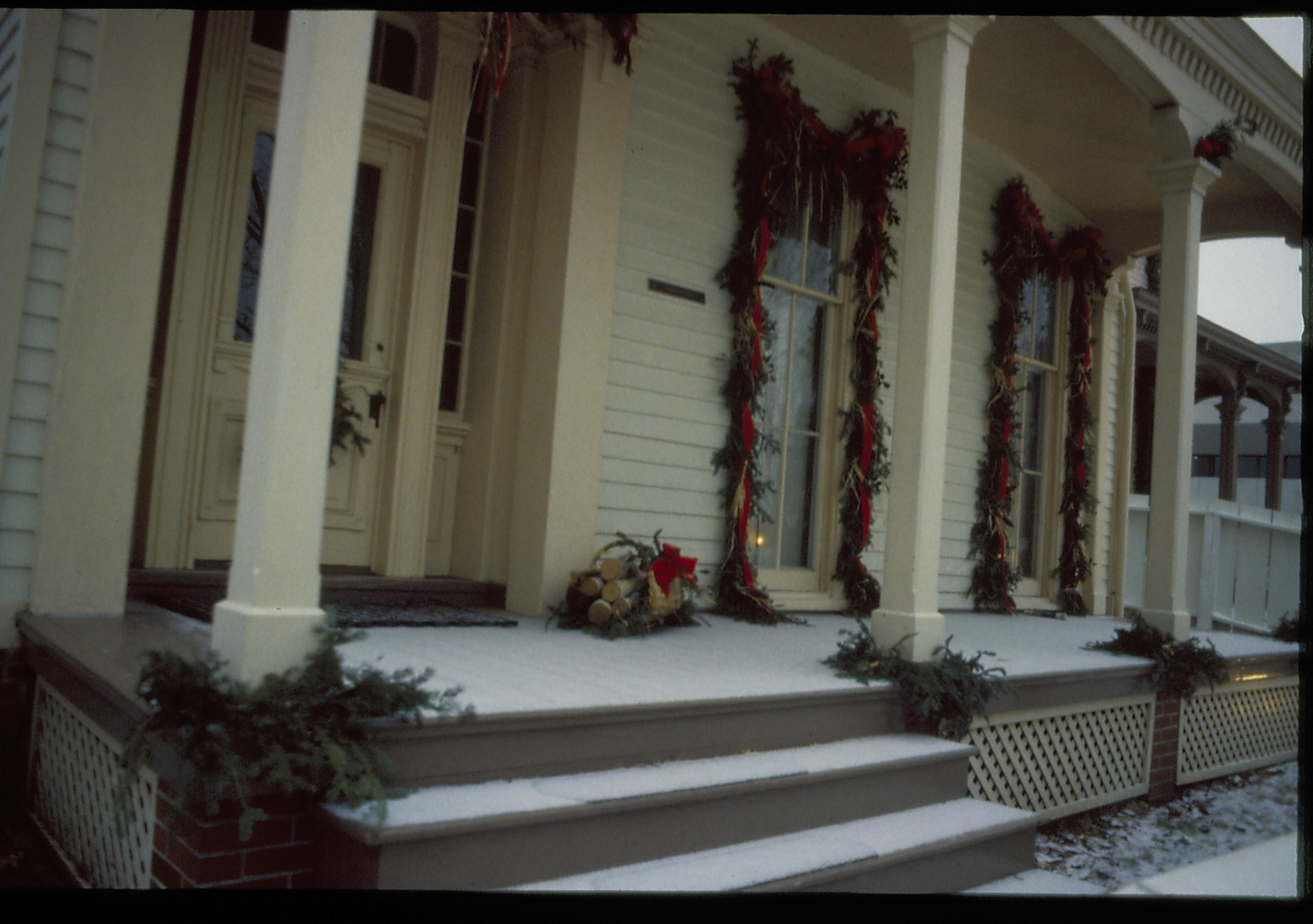 Lincoln Home NHS- Christmas in Lincoln Neighborhood Looking north west, Rosenwald house porch decorated for Christmas. Detail. Christmas, decorations, decor, porch, Rosenwald, Lyon, wreath, garland