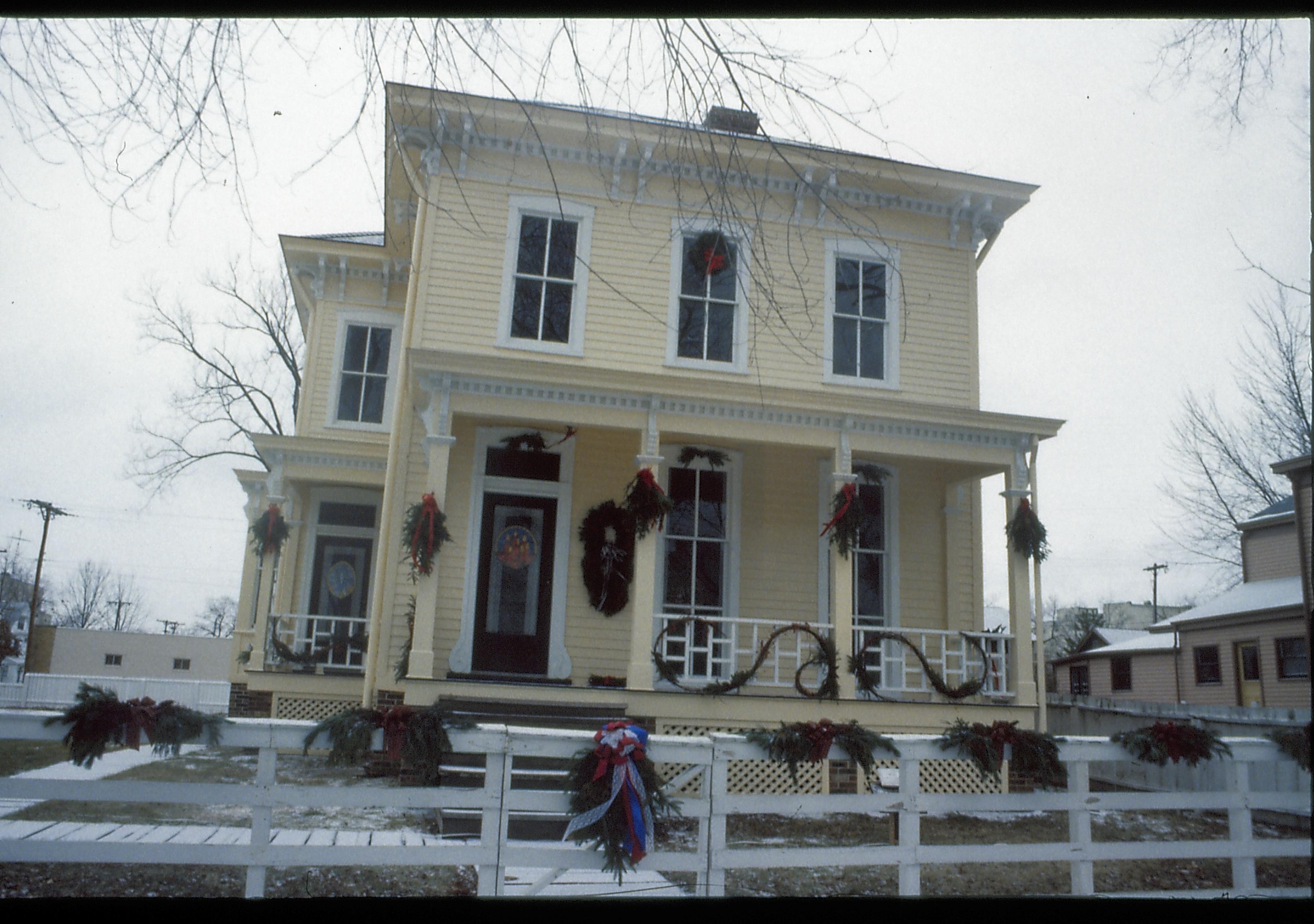 Lincoln Home NHS- Christmas in Lincoln Neighborhood Looking west from 8th Street, Shutt house decorated for Christmas. Christmas, decorations, Shutt, decor, wreath, garland, fence