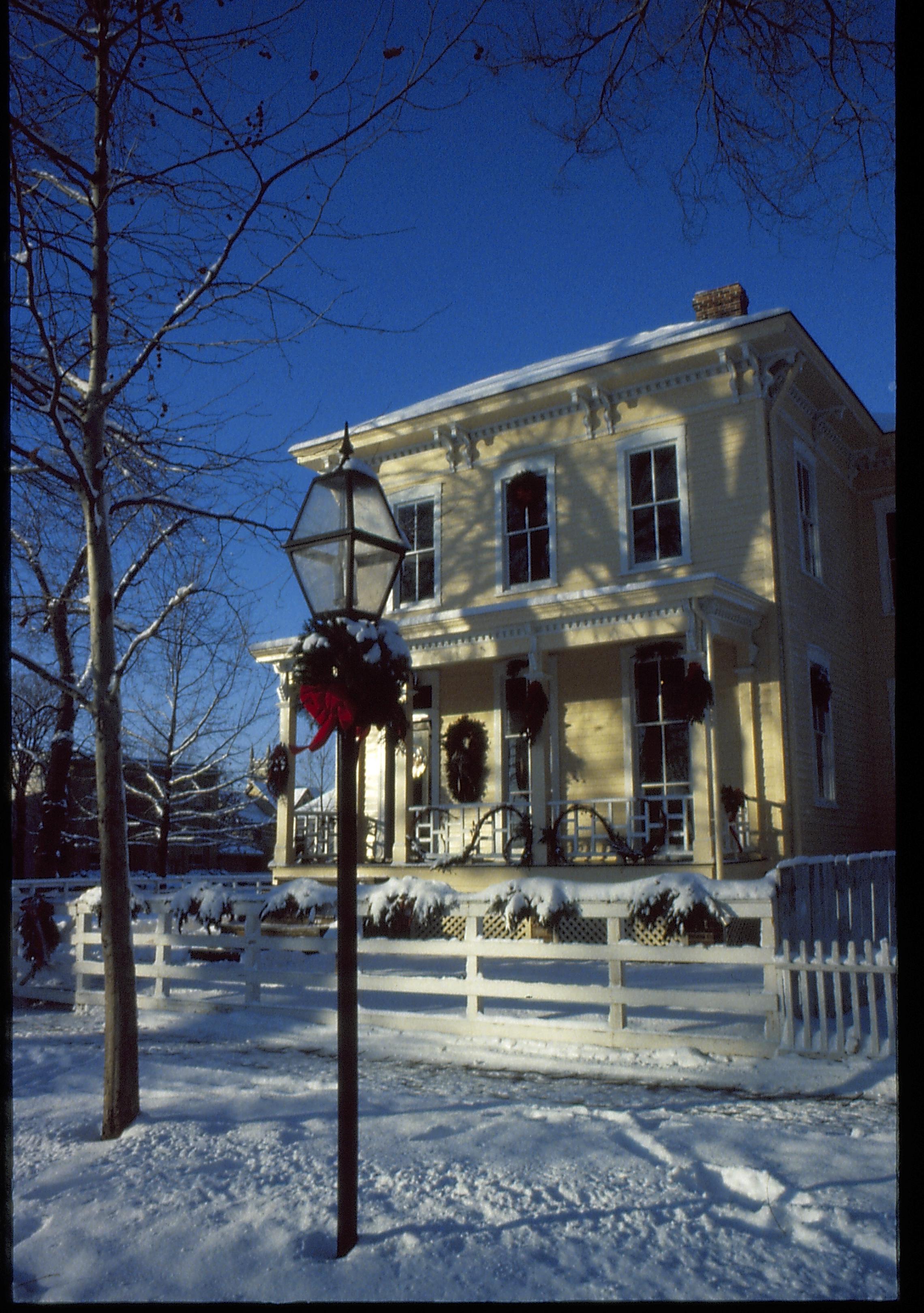 Lincoln Home NHS- Christmas in Lincoln Neighborhood Looking south west from 8th Street, Shutt house decorated for Christmas. Christmas, decorations, snow, Shutt, wreath, garland, decor