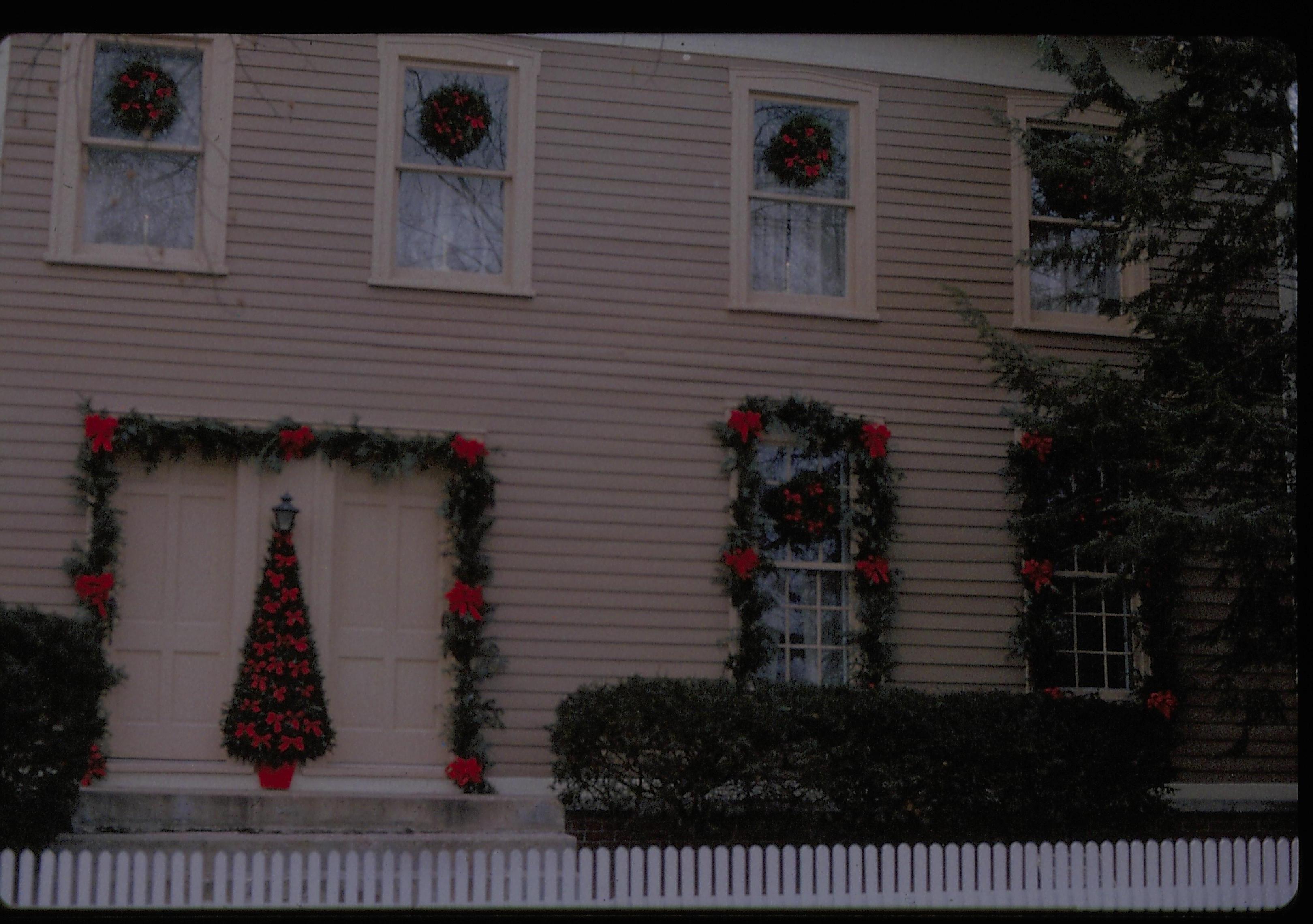 Lincoln Home NHS- Christmas in Lincoln Neighborhood Looking west from 8th Street, Miller house decorated for Christmas. Christmas, decorations, Miller, snow, decor, wreath, tree, garland