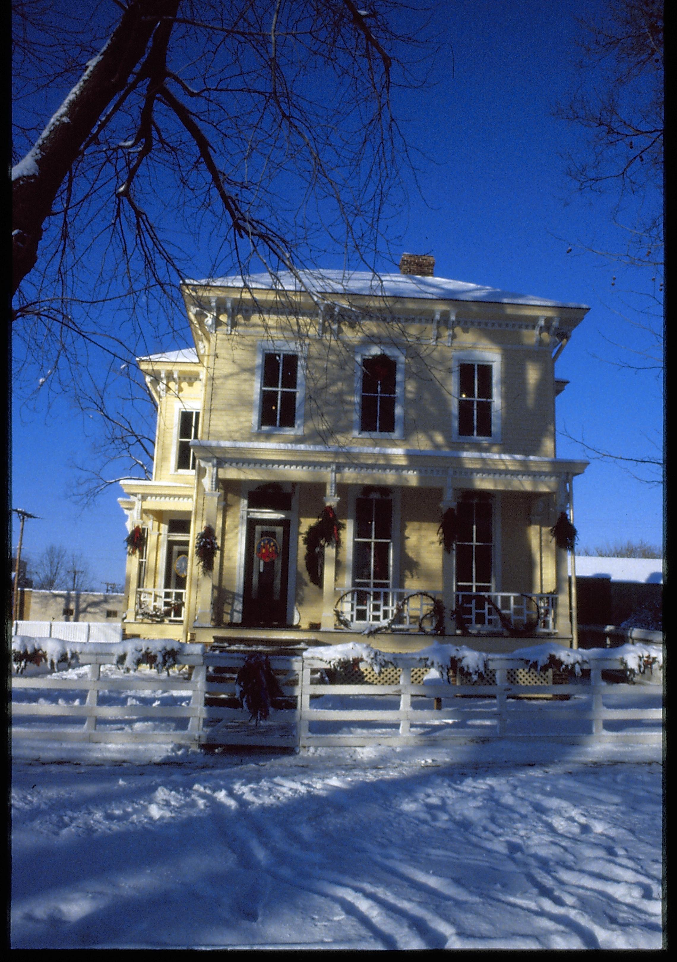 Lincoln Home NHS- Christmas in Lincoln Neighborhood Looking west from 8th Street, Shutt house decorated for Christmas. Christmas, decorations, Shutt, snow, wreath, garland, decor