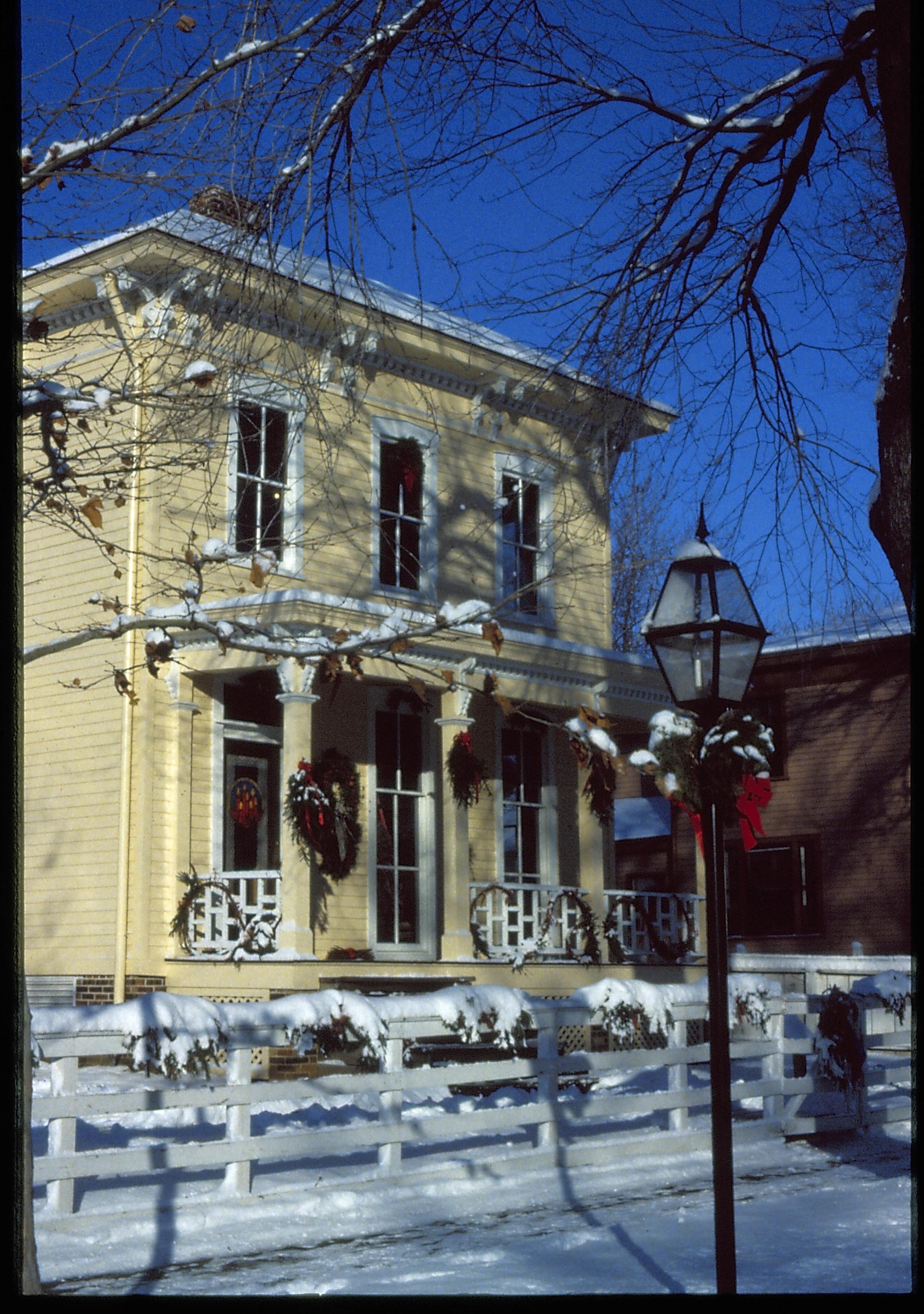 Lincoln Home NHS- Christmas in Lincoln Neighborhood Looking north west from 8th Street, Shutt house decorated for Christmas. Christmas, decorations, Shutt, snow, wreath, garland, decor