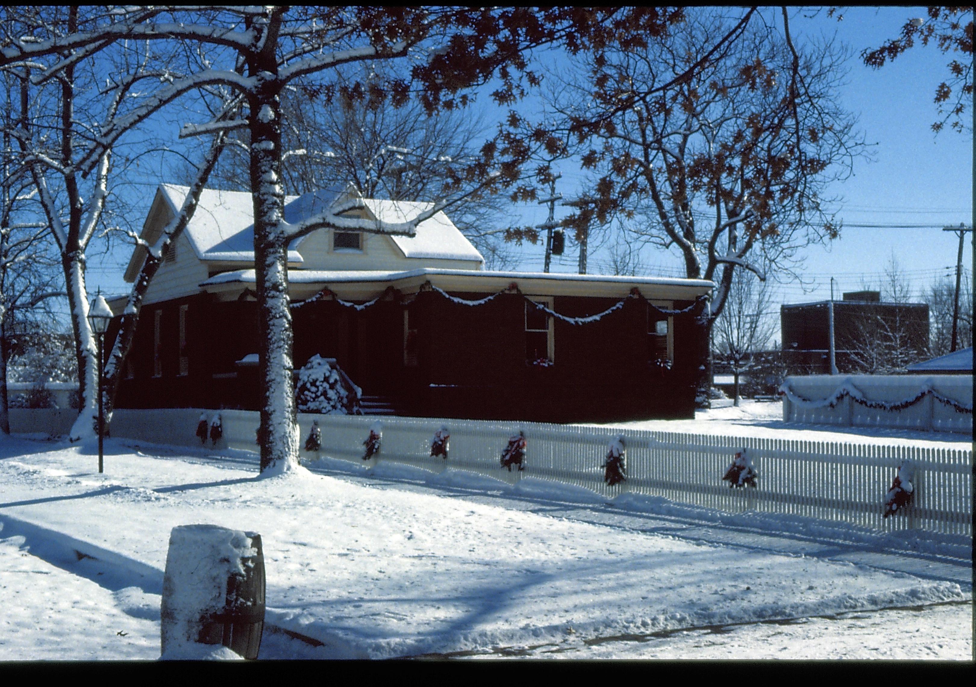 Lincoln Home NHS- Christmas in Lincoln Neighborhood Looking east from 8th and Jackson, Arnold house decorated for Christmas. Christmas, decorations, Arnold, snow, decor, wreath, garland