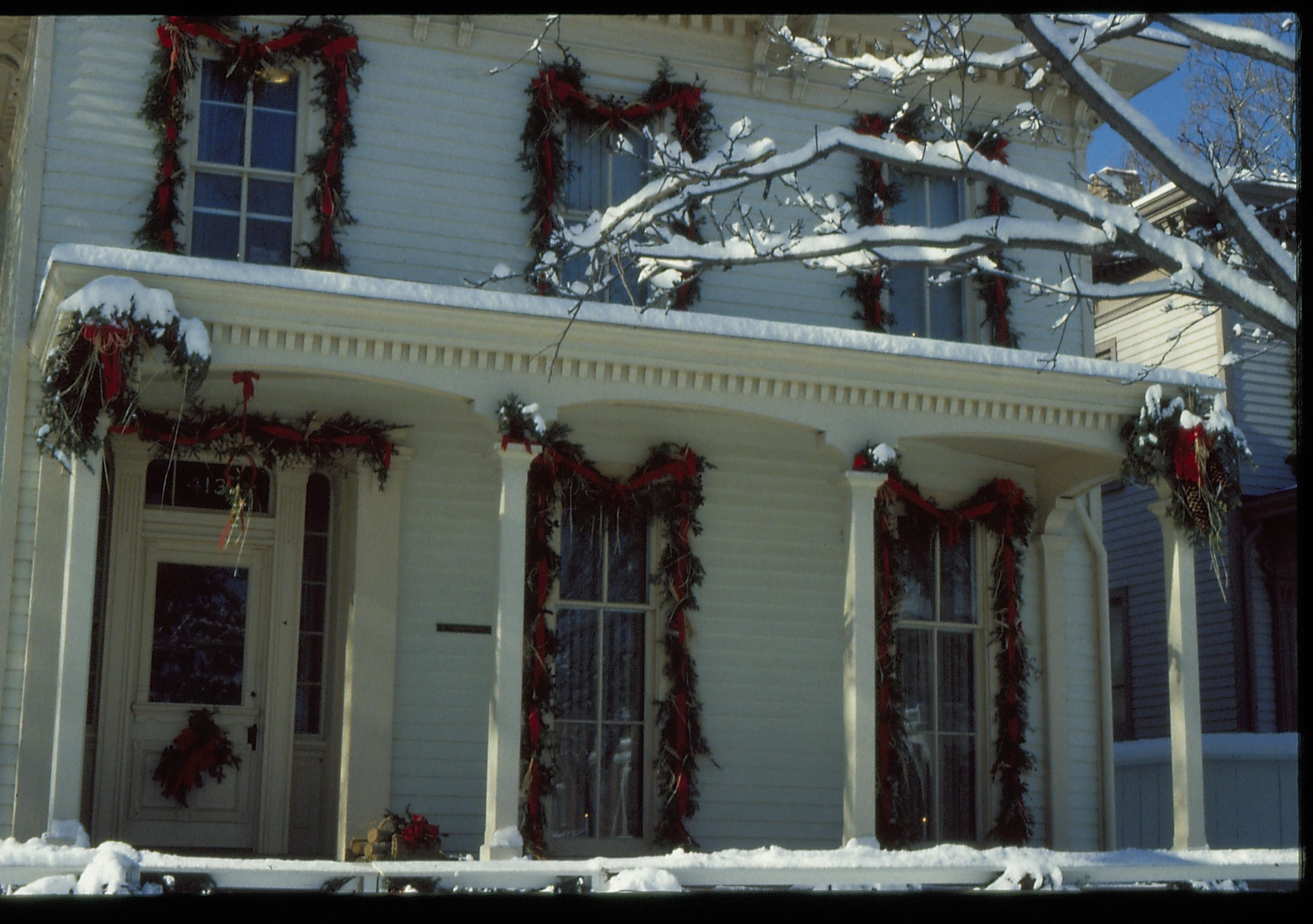 Lincoln Home NHS- Christmas in Lincoln Neighborhood Looking west from 8th Street, Rosenwald house decorated for Christmas. Christmas, decorations, decor, wreath, garland, Lyon, Rosenwald, snow