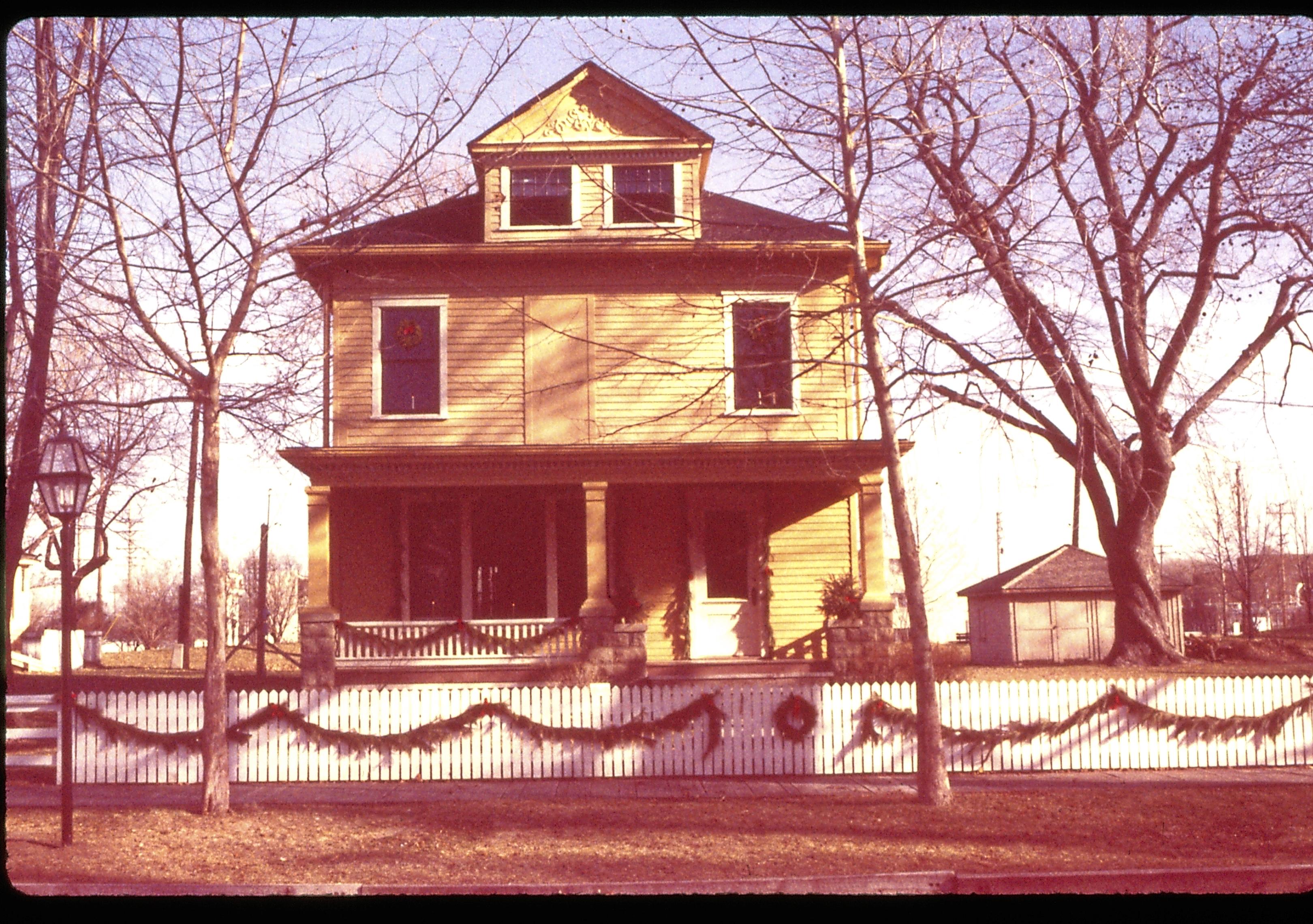 Lincoln Home NHS- Christmas in Lincoln Neighborhood Looking east from 8th Street, Cook house decorated for Christmas. Christmas, decorations, decor, Cook, wreath, garland