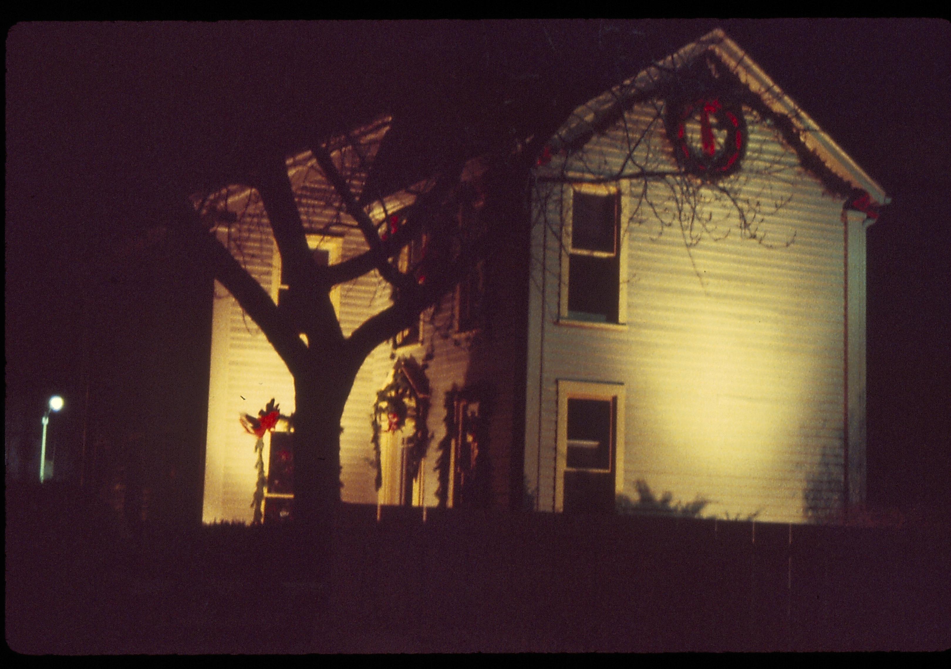 Lincoln Home NHS- Christmas in Lincoln Neighborhood Looking east, Morse house decorated for Christmas. Night. Christmas, decorations, night, Morse, wreath, garland, decor