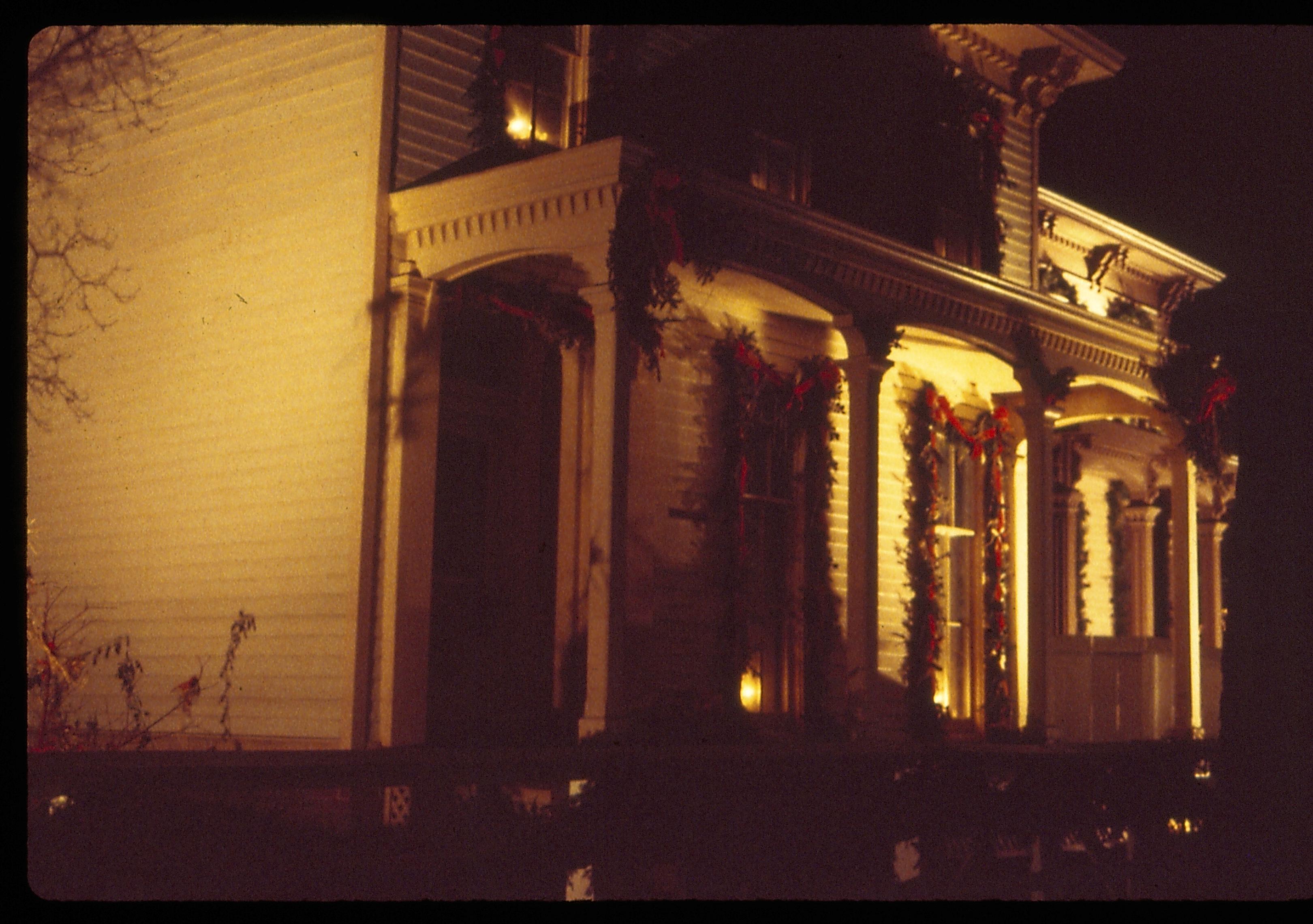 Lincoln Home NHS- Christmas in Lincoln Neighborhood Looking north west from boardwalk, Rosenwald house decorated for Christmas. Night. Christmas, decorations, night, Rosenwald, Lyon, wreath, garland