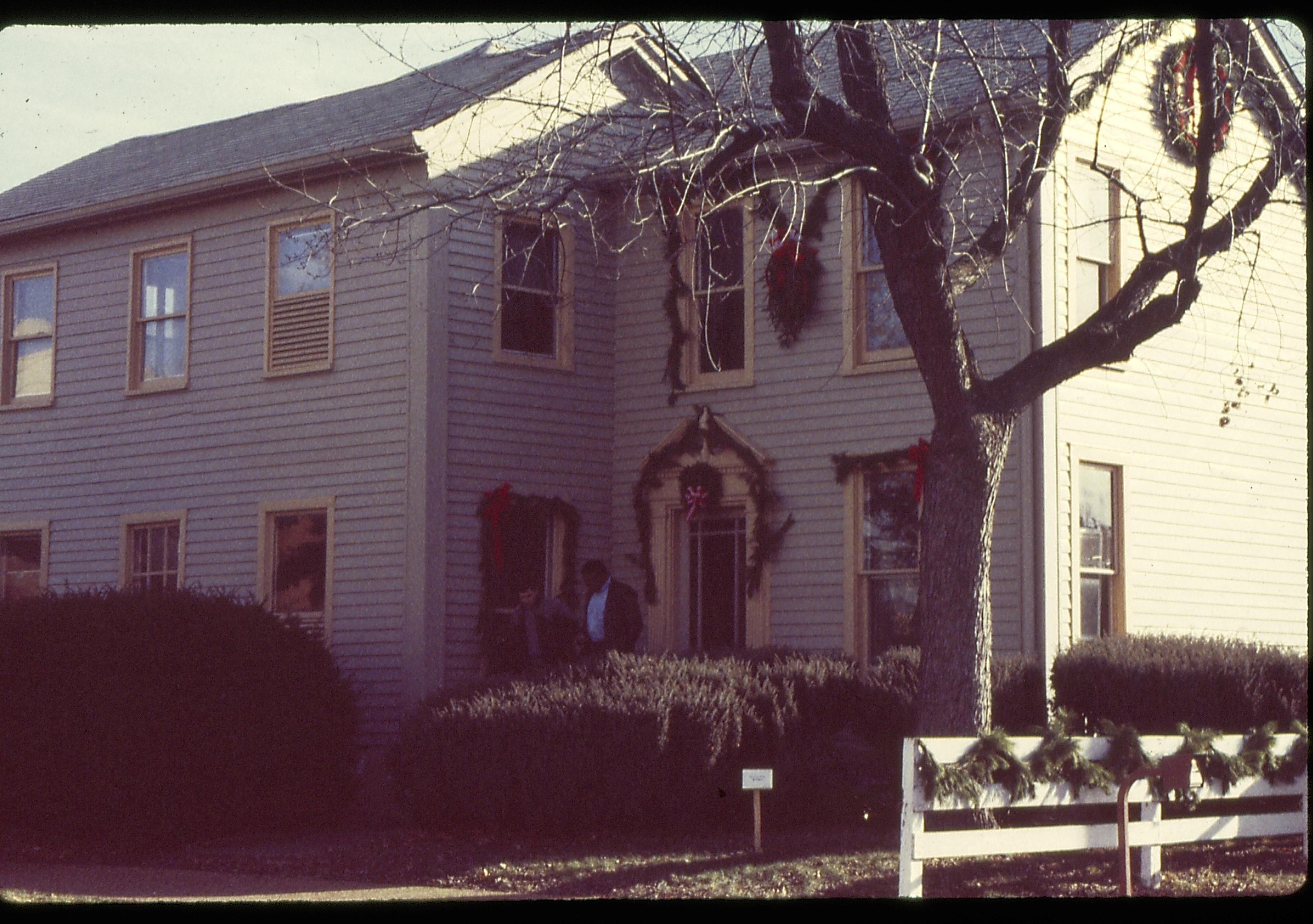 Lincoln Home NHS- Christmas in Lincoln Neighborhood Looking south east (?) from alley, Morse house decorated for Christmas. Detail. Christmas, decorations, Morse, garland, wreath, decor