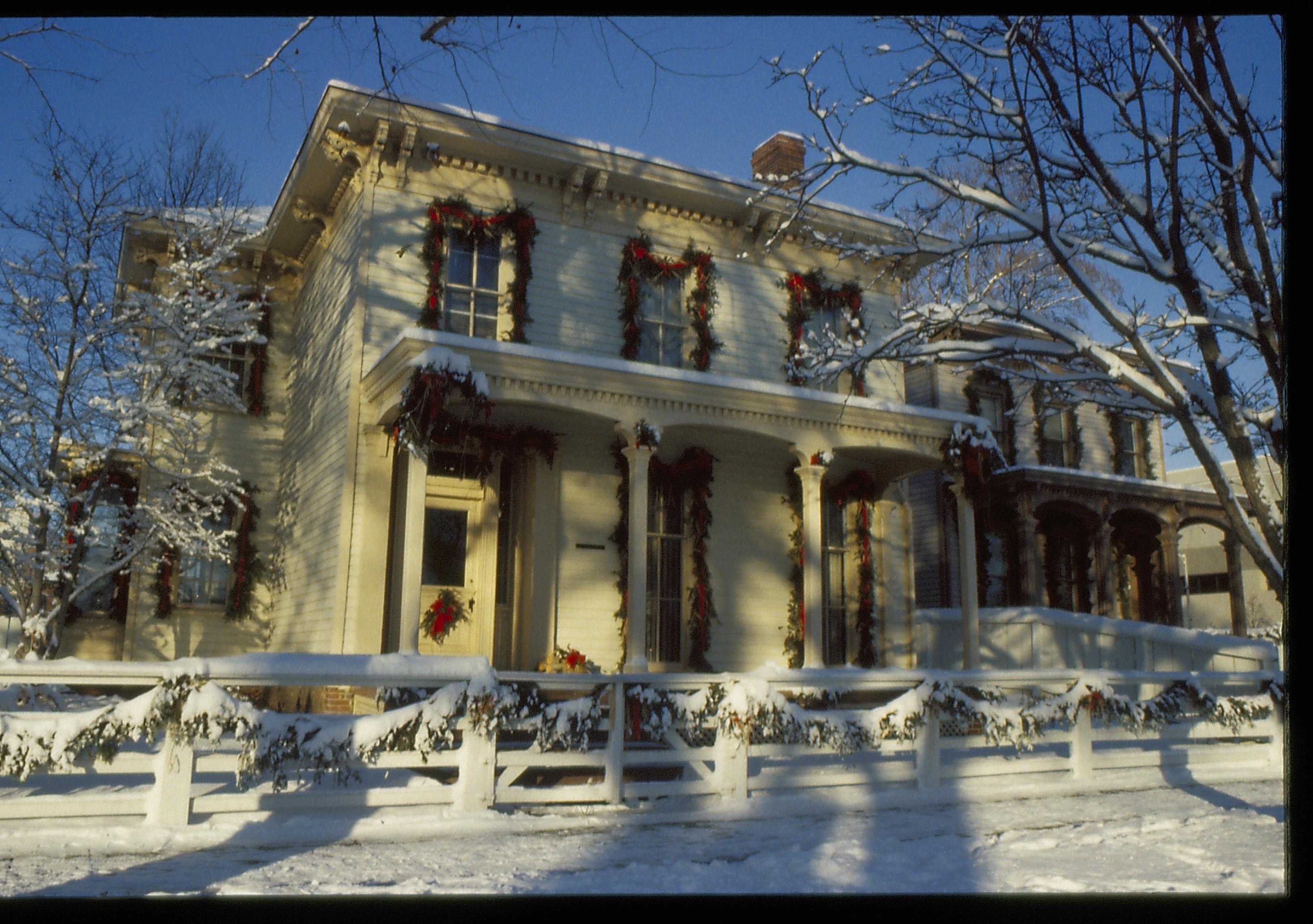 Lincoln Home NHS- Christmas in Lincoln Neighborhood Looking west from 8th Street, Rosenwald house decorated for Christmas. Christmas, decorations, snow, Rosenwald, Lyon, snow, wreath, garland