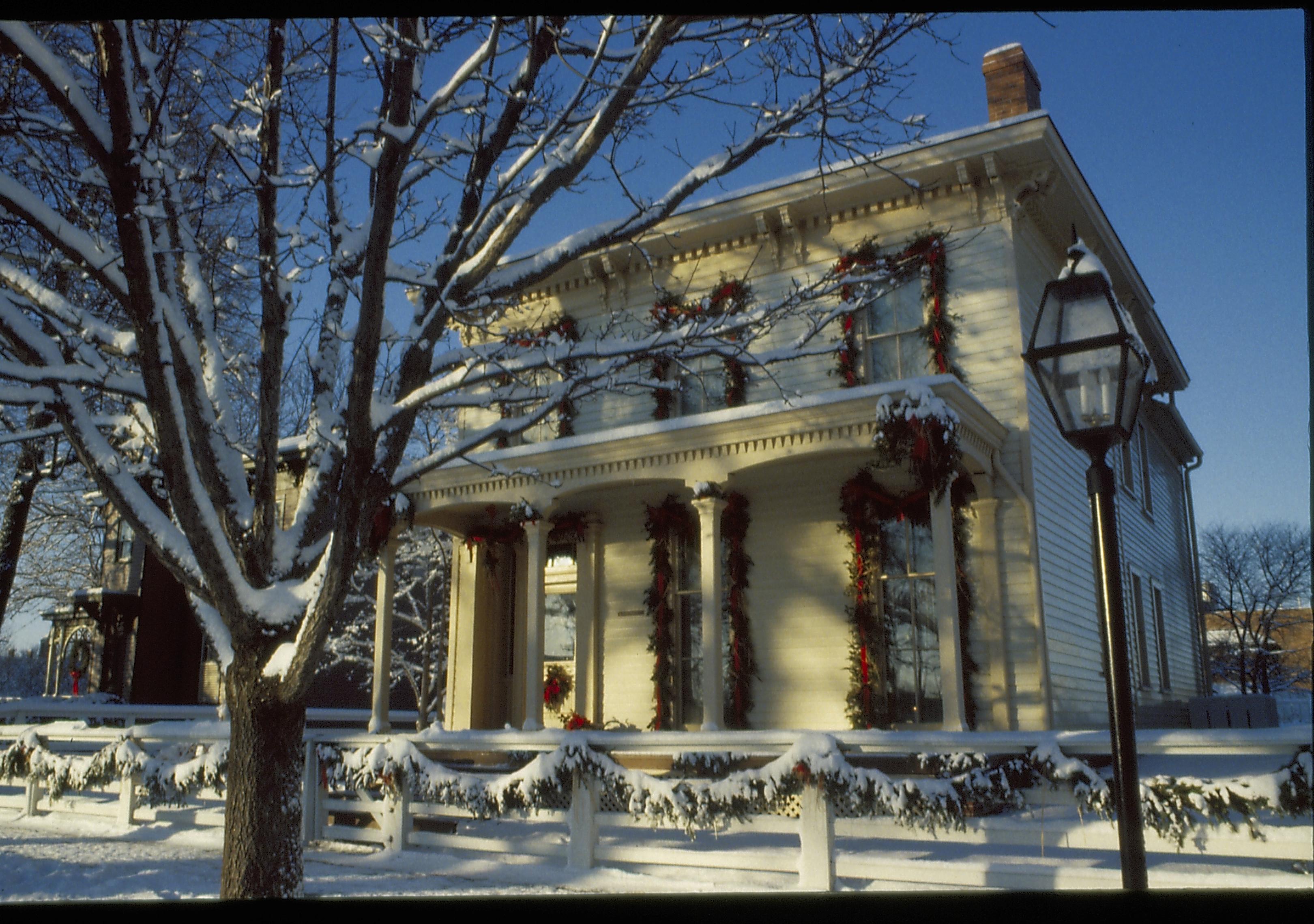 Lincoln Home NHS- Christmas in Lincoln Neighborhood Looking south west from 8th Street, Rosenwald house decorated for Christmas. Christmas, decorations, Rosenwald, Lyon, decor, wreath, garland, snow