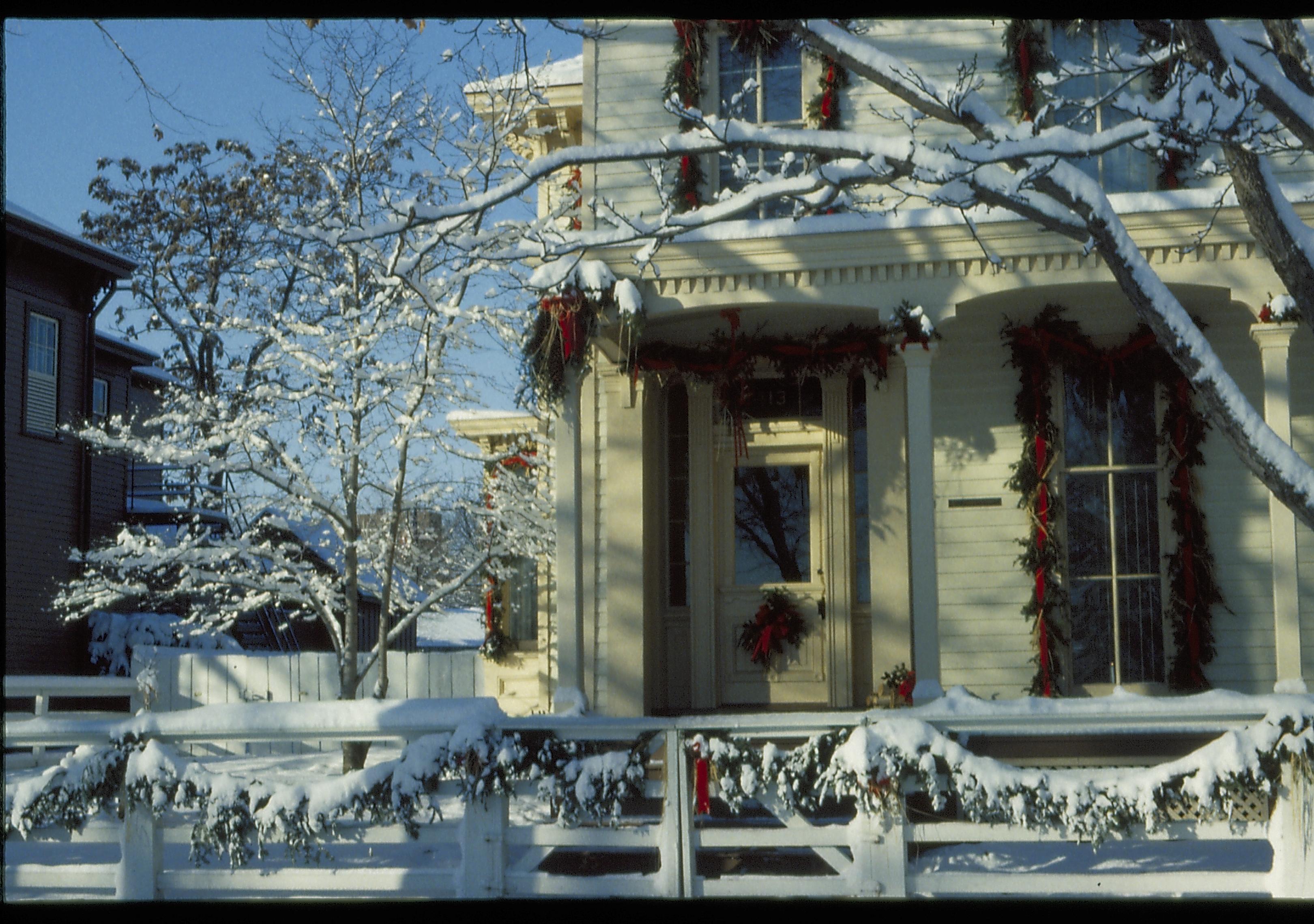 Lincoln Home NHS- Christmas in Lincoln Neighborhood Looking west from 8th Street, Rosenwald house decorated for Christmas. Detail. Christmas, decorations, decor, wreath, Rosenwald, Lyon, fence, snow