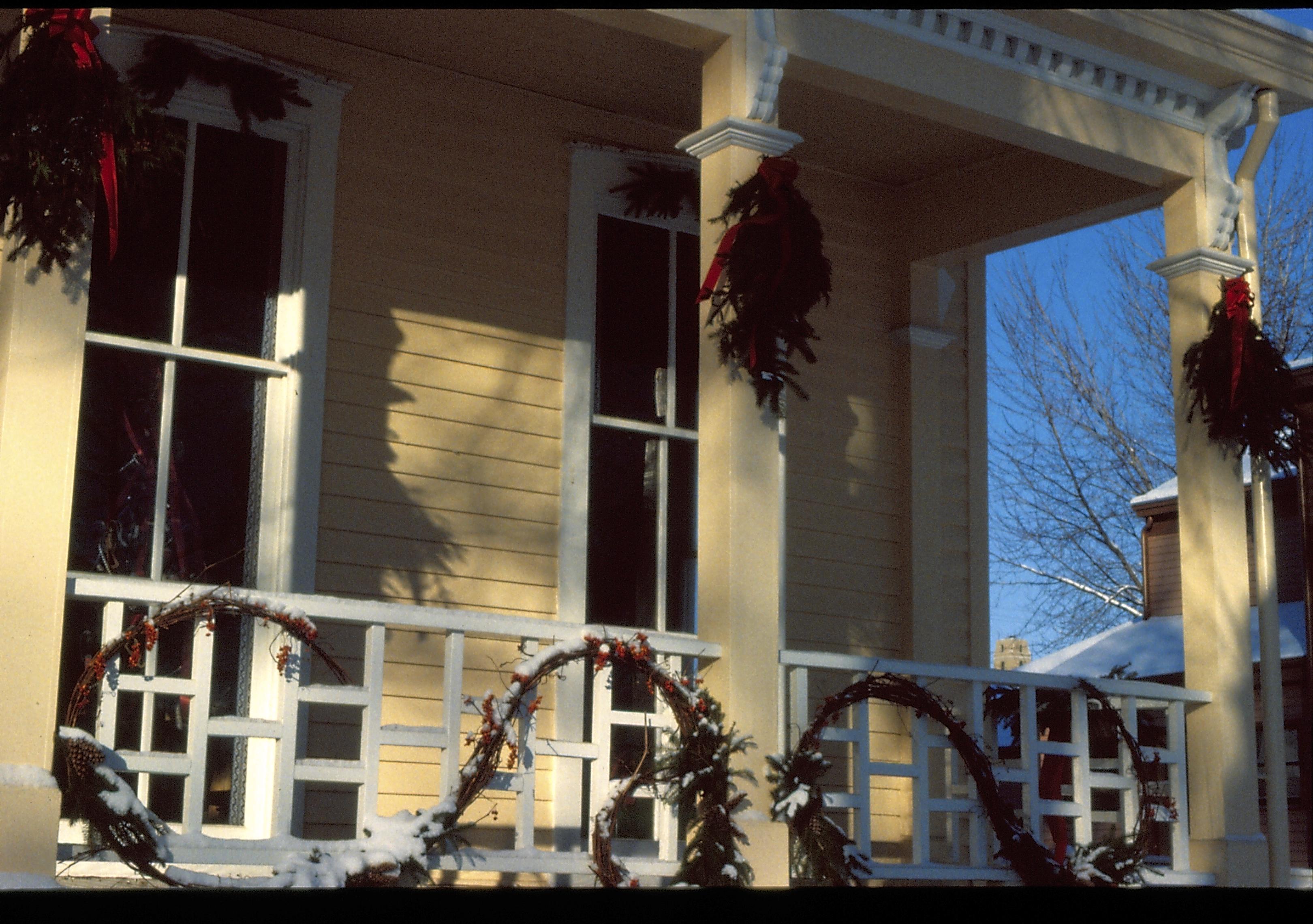 Lincoln Home NHS- Christmas in Lincoln Neighborhood Looking north west, Shutt house porch rail decorated for Christmas. Detail. Christmas, decorations, Shutt, porch, rail,  decor, garland, wreath