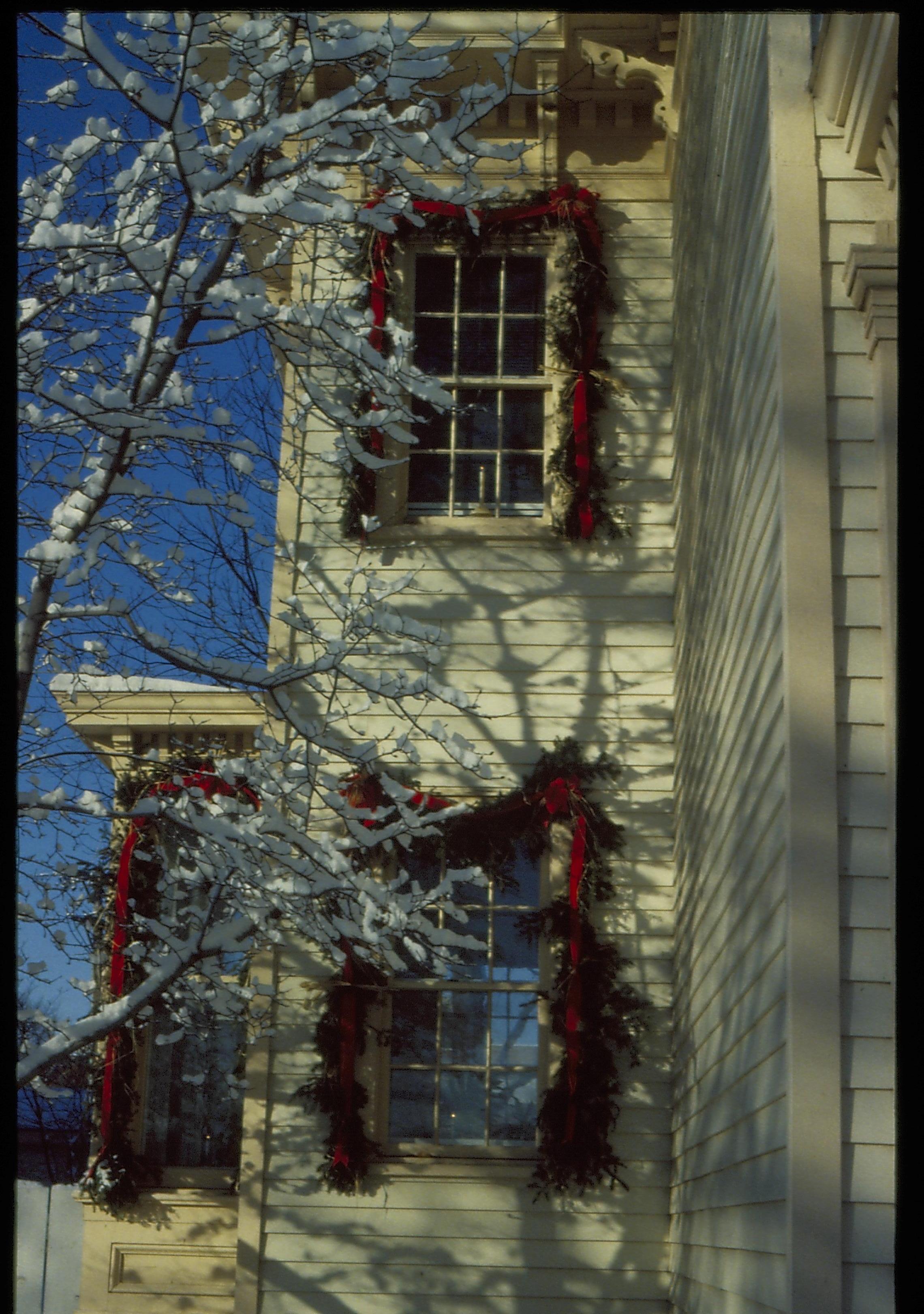 Lincoln Home NHS- Christmas in Lincoln Neighborhood Looking west from yard, Shutt house decorated for Christmas. Detail Christmas, decorations, decor, Shutt, garland, snow