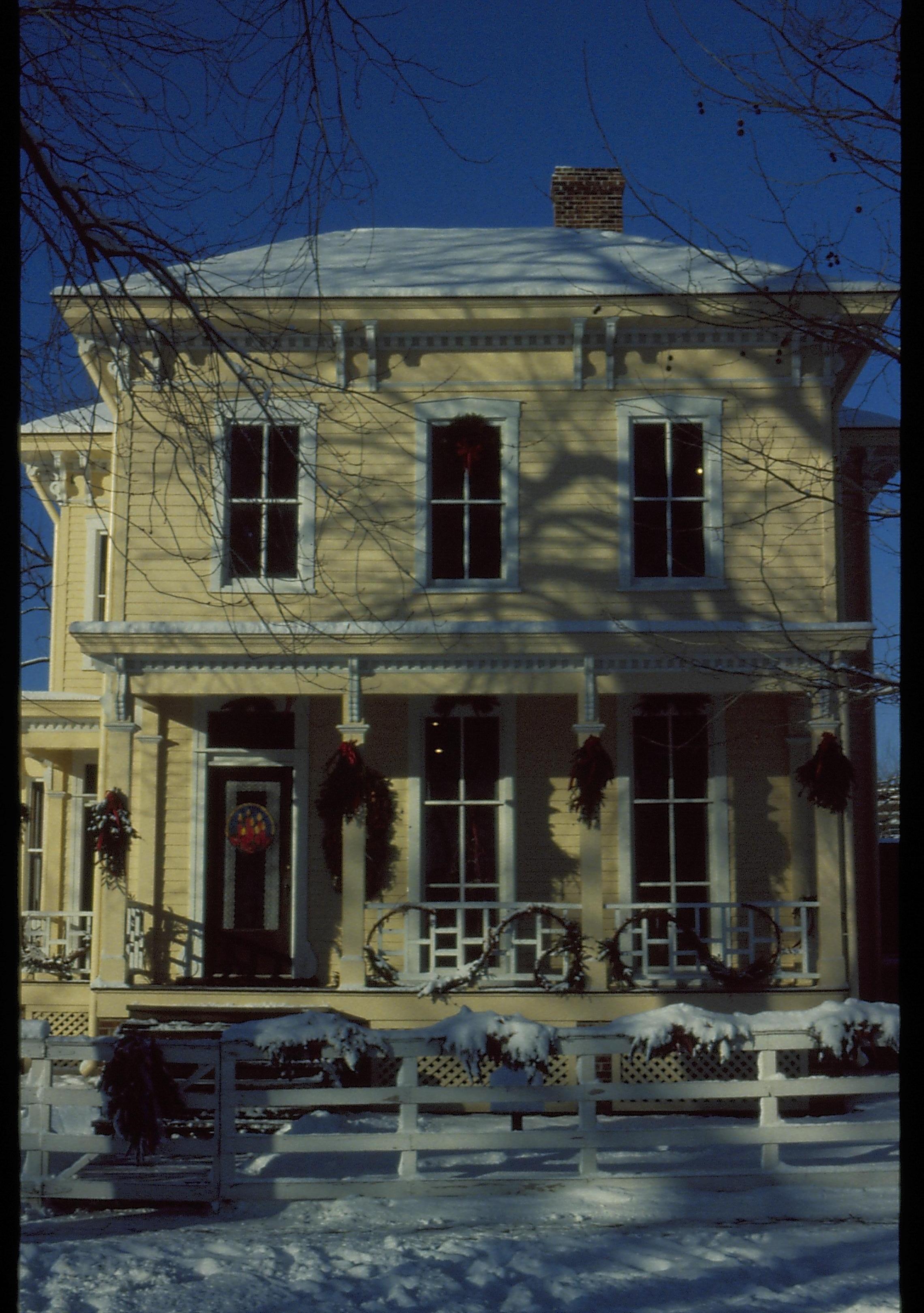 Lincoln Home NHS- Christmas in Lincoln Neighborhood Looking west from 8th Street, Shutt house decorated for Christmas. Christmas, decorations, Shutt, wreath, garland, snow